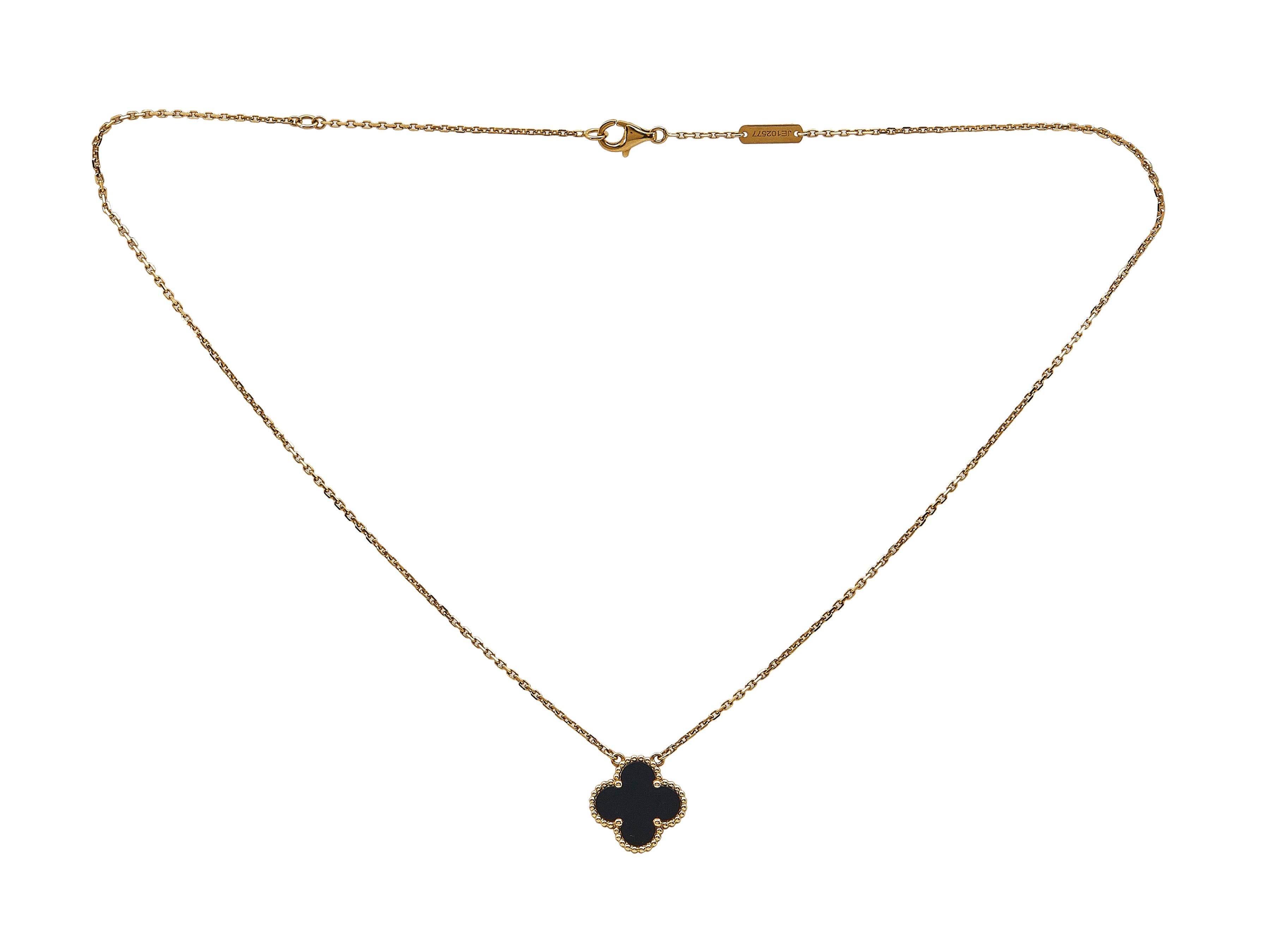 Van Cleef & Arpels Vintage Alhambra 18K Yellow Gold Onyx Pendant Necklace In Excellent Condition For Sale In New York, NY