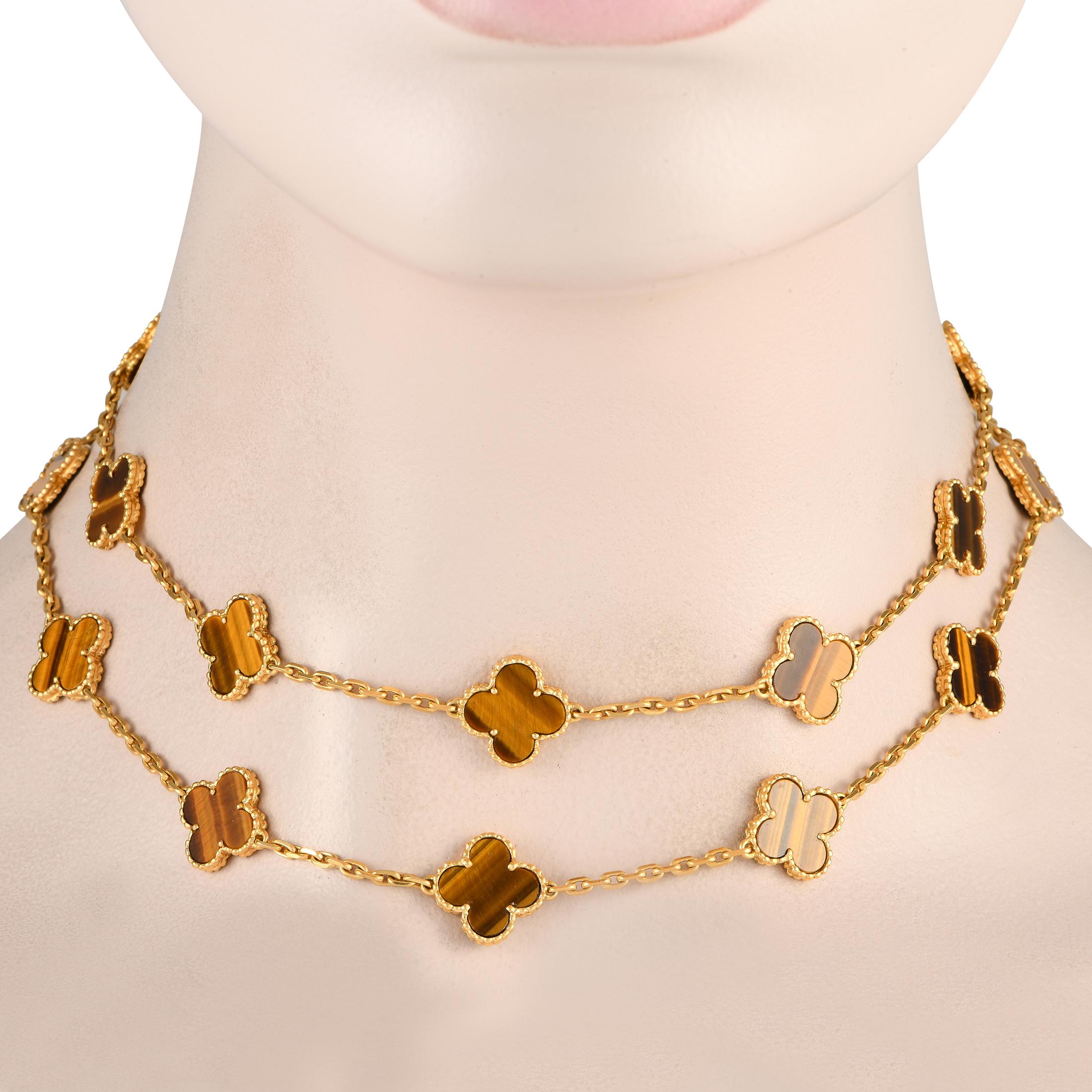 This Van Cleef & Arpels Vintage Alhambra necklace is perfect for the discerning fashionista with a fierce personality. This relentless elegant necklace is made from 18K yellow gold and features 20 Alhambra motifs, each with Tiger Eye inlay. The