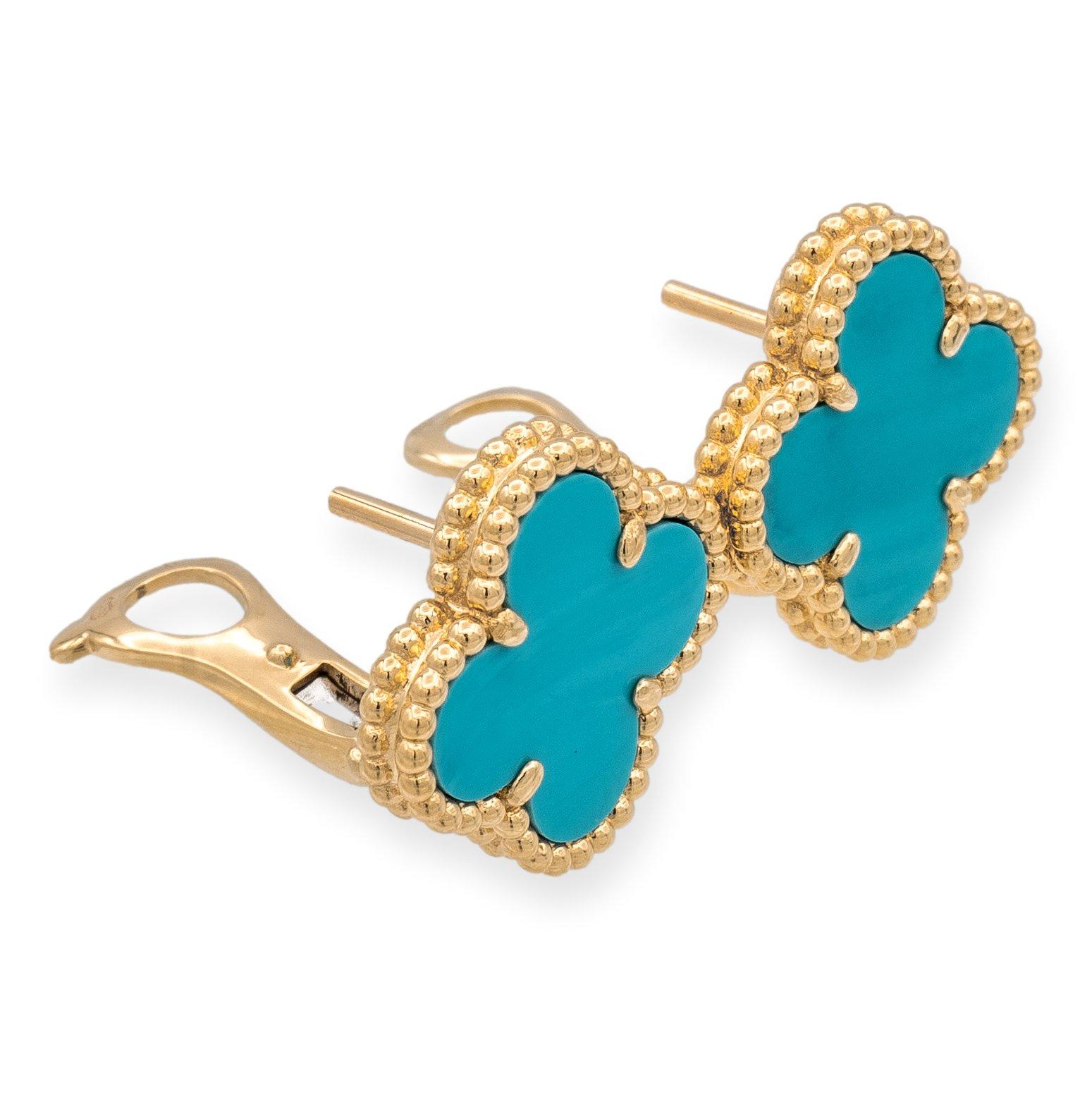 Van Cleef & Arpels clip earrings from the Vintage Alhambra collection finely crafted in 18 Karat Yellow Gold featuring 2 signature turquoise clover motifs and large omega clip backs and posts . Each ornament measures 0.59” Wide and 0.59” Long. (15