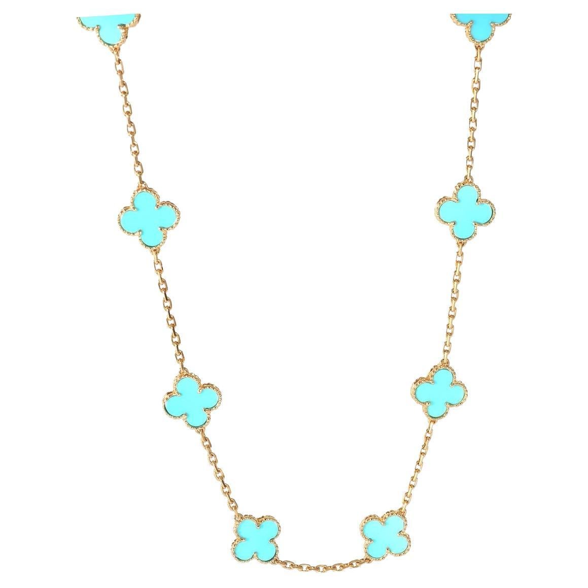 This classic vintage Van Cleef & Arpels necklace is crafted in 18k yellow gold and features 20 lucky clover motifs inlaid with turquoise in round bead settings. Made in France. 
Comes with original case serial number and papers
Clasp in 18K yellow