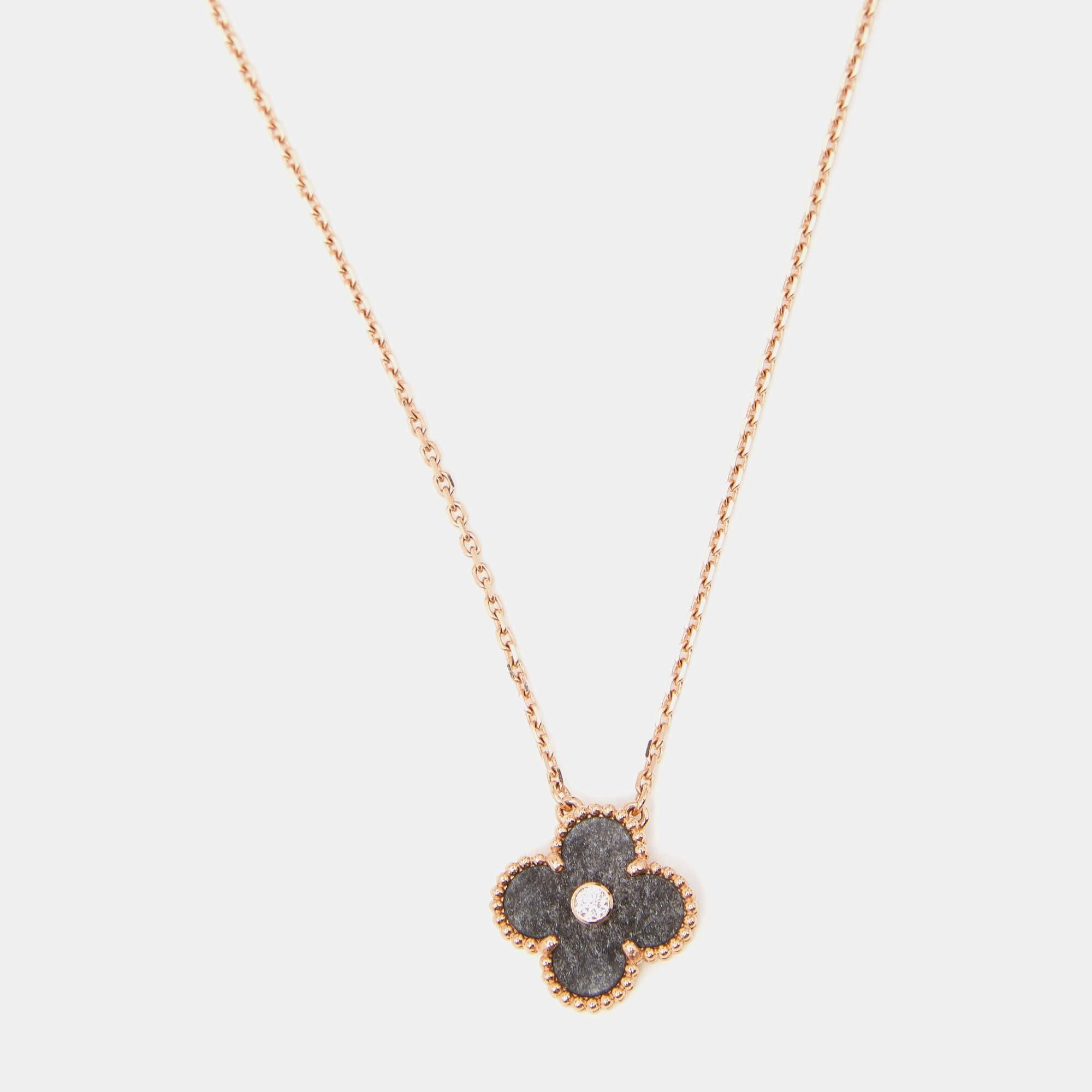 Experience timeless allure with the Van Cleef and Arpels Vintage Alhambra 2023 Holiday Limited necklace. Crafted with precision it merges the rich hues of obsidian with the brilliance of diamonds set against the warm glow of rose gold. Each delicate