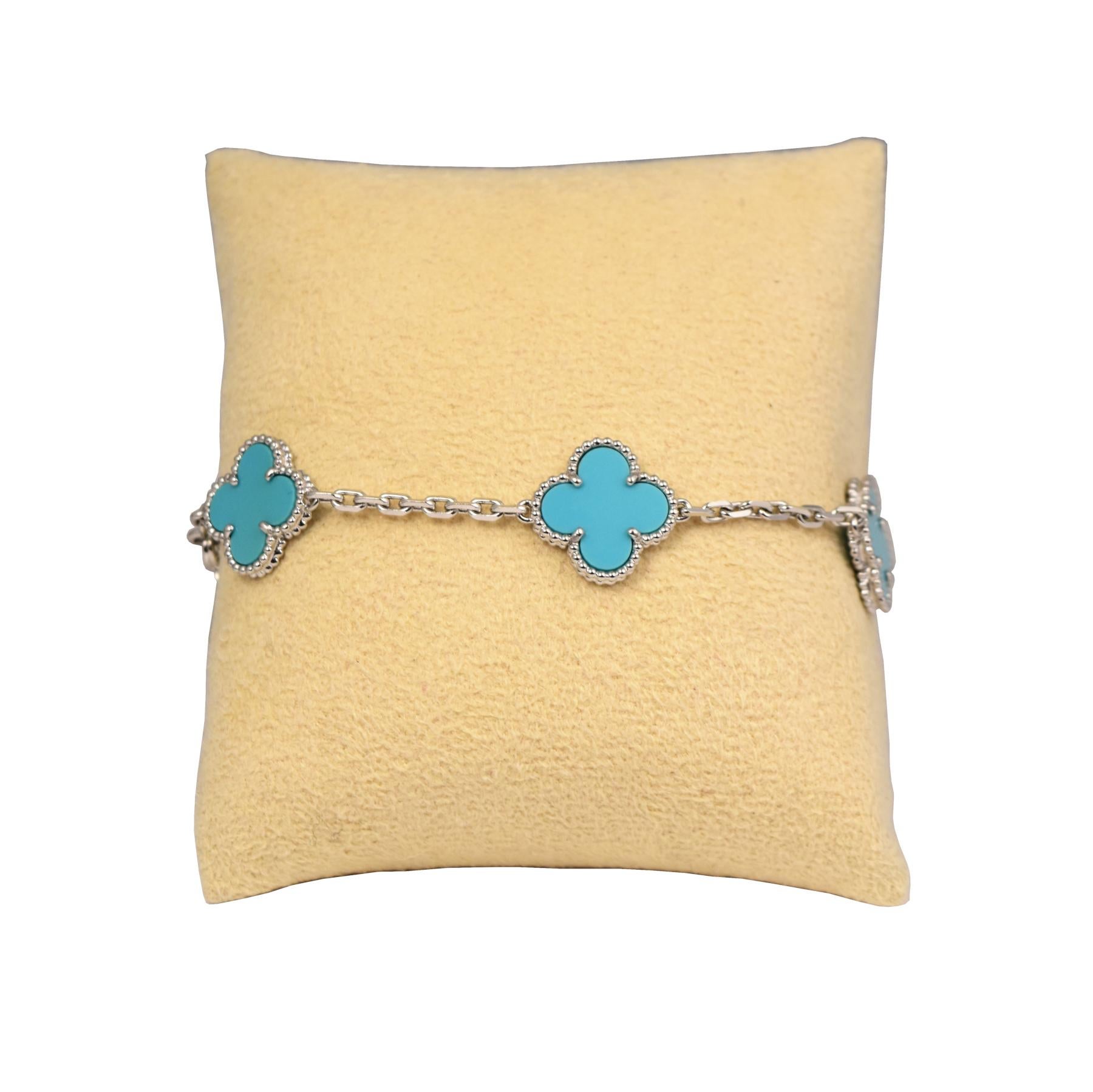 Designer: Van Cleef & Arpels

Collection: Vintage Alhambra

Style: 5 Motifs Bracelet

Material: White Gold

Metal Purity: 18k

Stones: Turquoise

Bracelet Length: 7.5 inches

Hallmark: VCA 750 Serial No.

Includes:  24 Months Brilliance Jewels