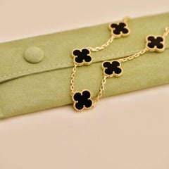 Van Cleef & Arpels Vintage Alhambra Armband aus 18 Karat Gelbgold mit 5 Motiven aus Onyx