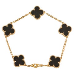 Van Cleef & Arpels Vintage Alhambra Armband aus 18 Karat Gelbgold mit 5 Motiven aus Onyx