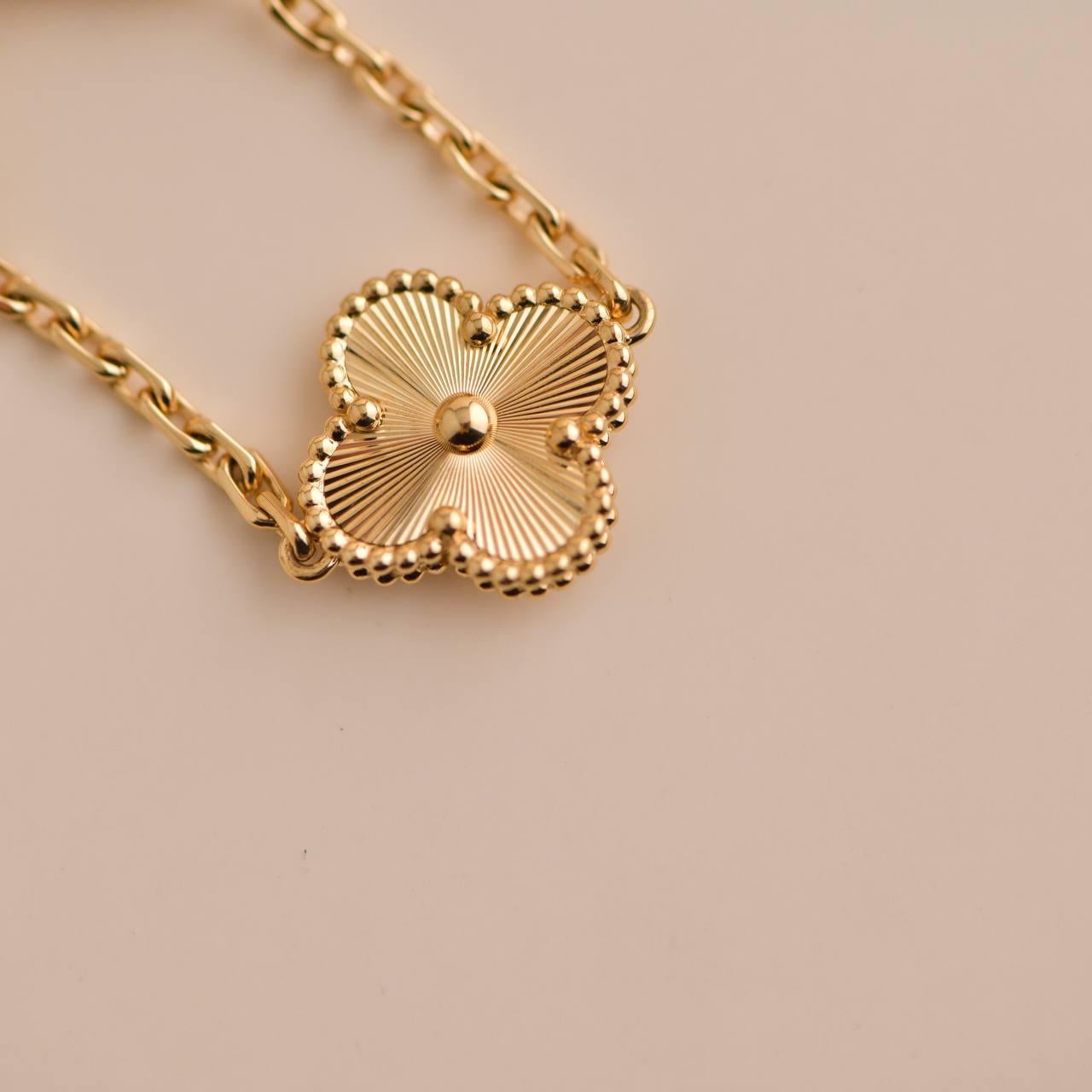 van cleef gold guilloche bracelet