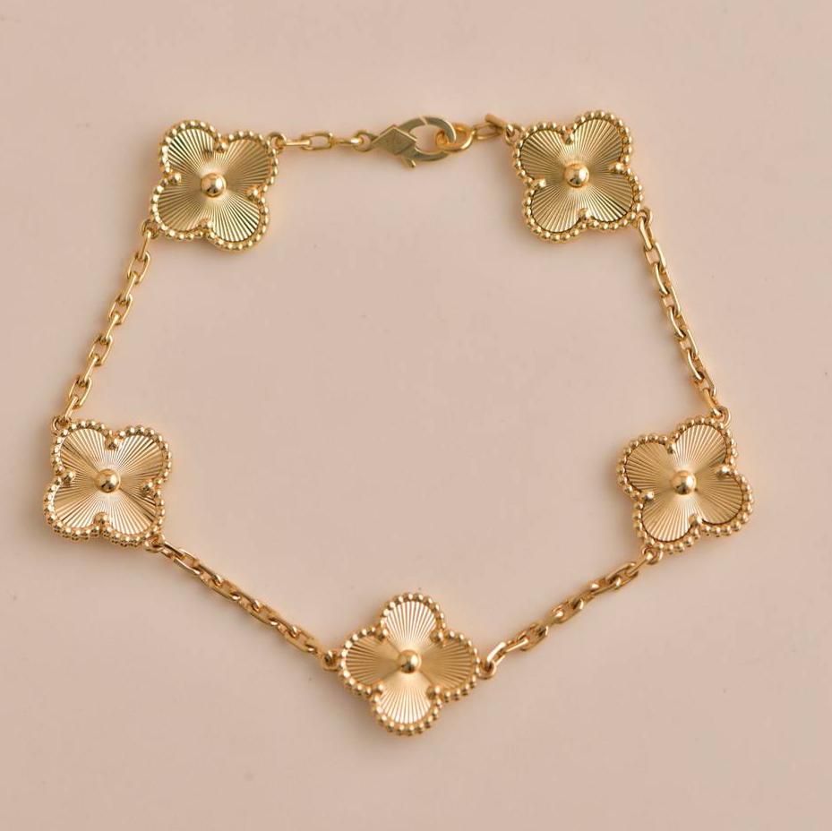 Women's or Men's Van Cleef & Arpels Vintage Alhambra 5 Motifs Guilloché Yellow Gold Bracelet