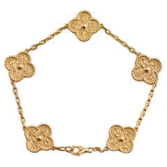 Van Cleef & Arpels Vintage Alhambra Gelbes gehämmertes Goldarmband mit 5 Motiven