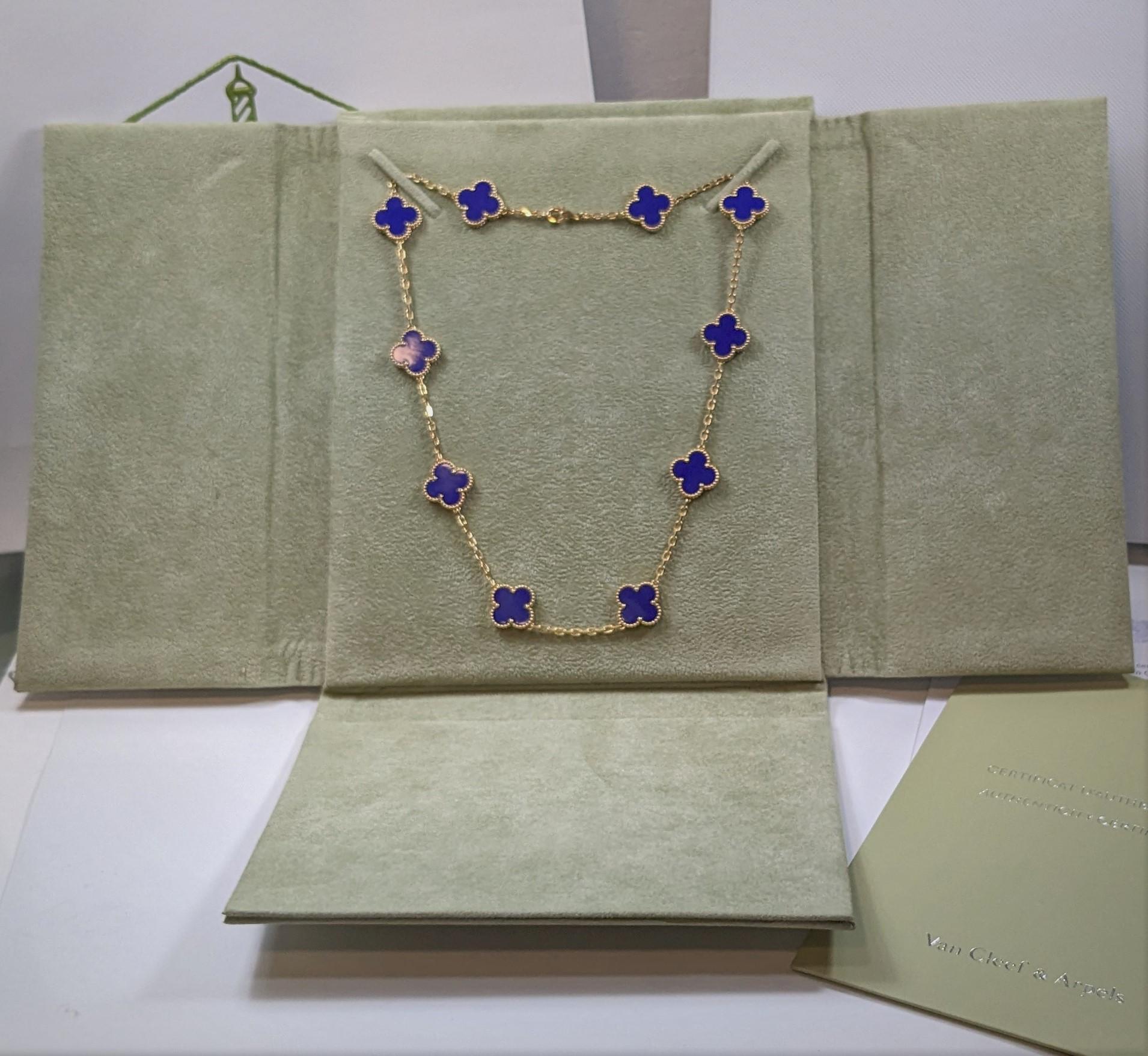 This classic vintage Van Cleef & Arpels necklace is crafted in 18k yellow gold and features 10 lucky clover motifs inlaid with blue agate in round bead settings. Made in France. Measurements: 0.59