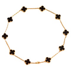Van Cleef & Arpels, collier vintage Alhambra en or jaune à motifs 10 onyx noirs