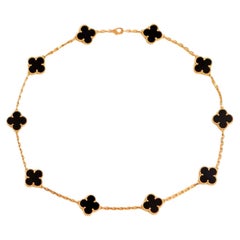 Van Cleef & Arpels, collier vintage Alhambra en or jaune à motifs 10 onyx noirs