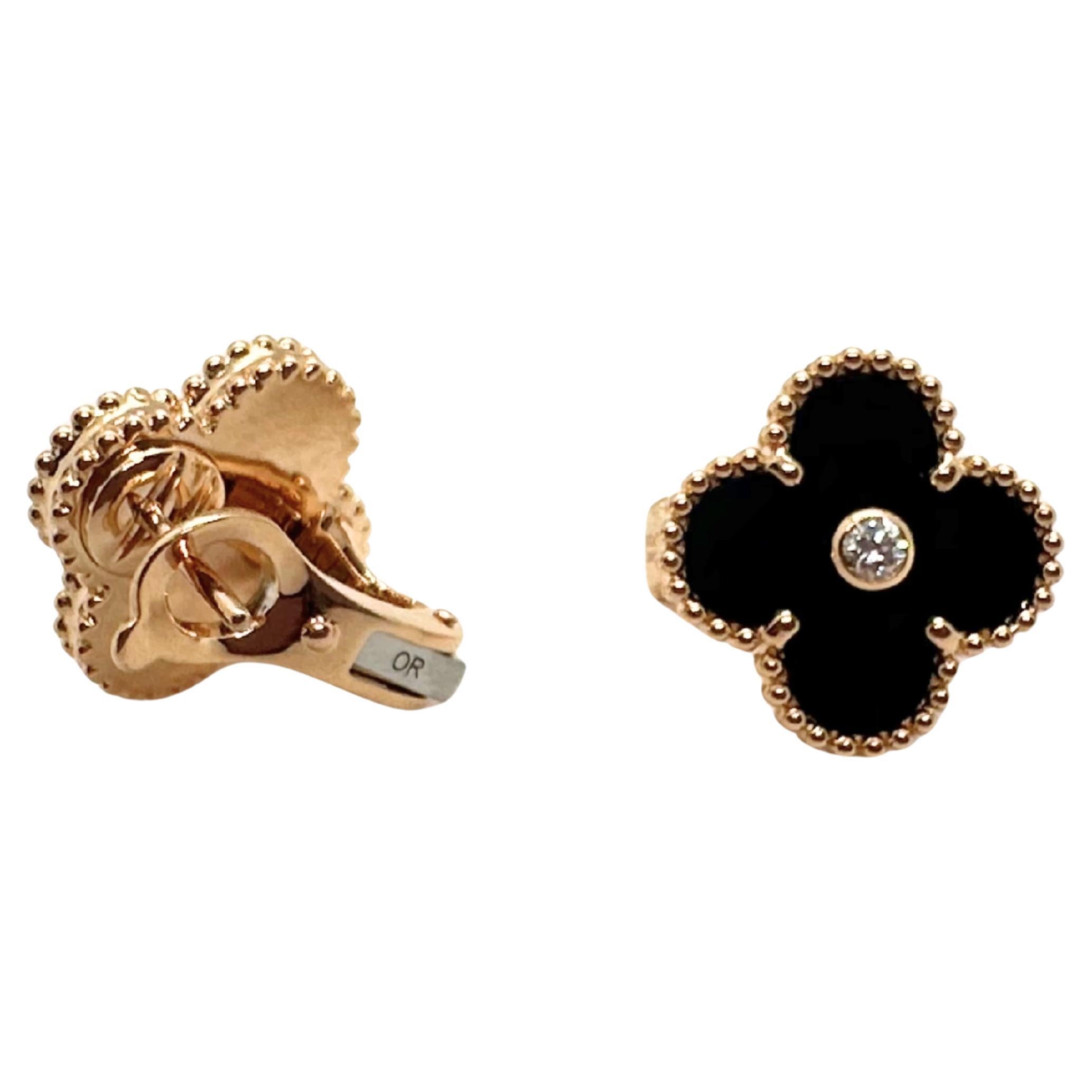 Boucles d
oreilles Alhambra vintage