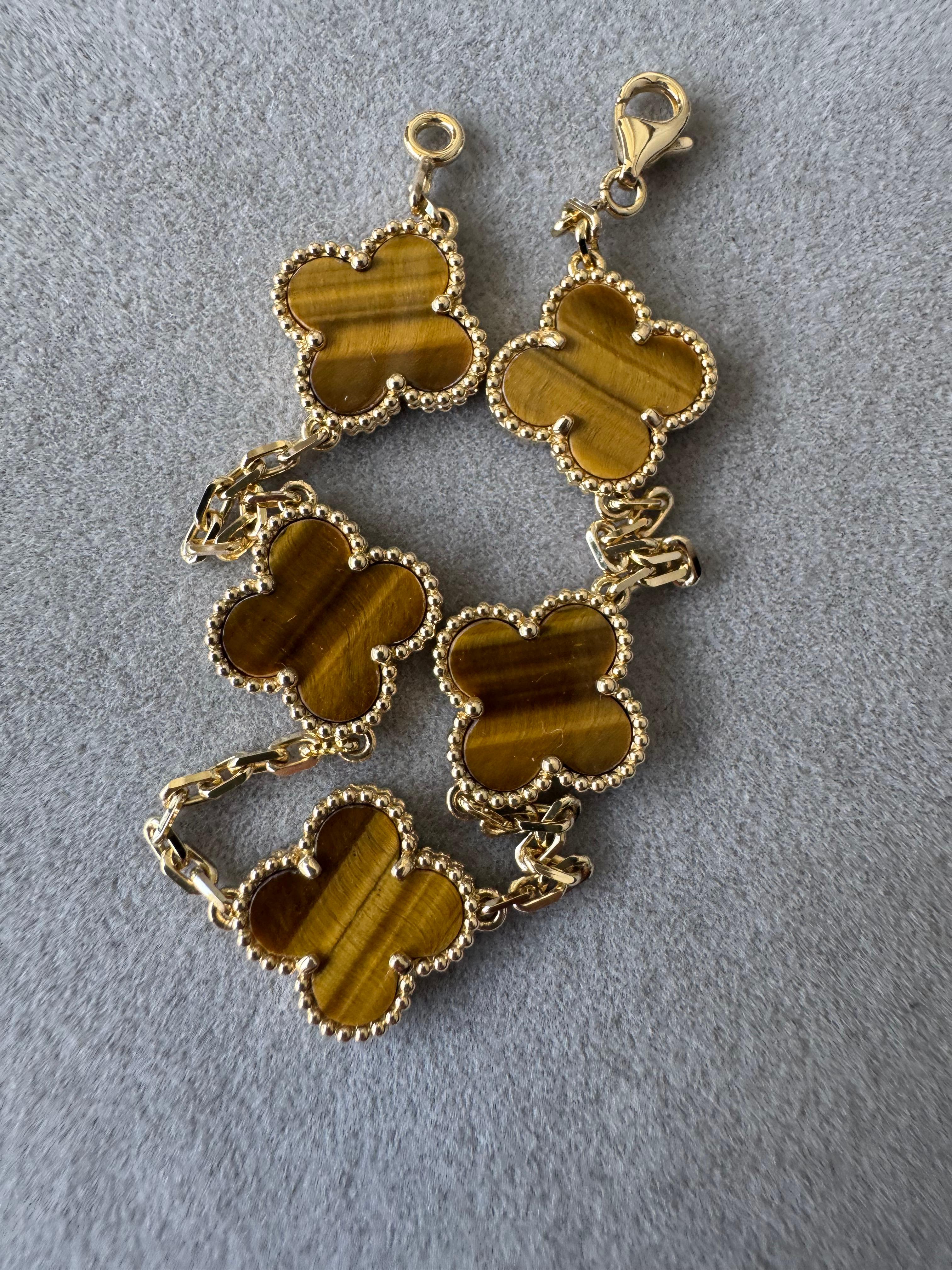Extremely beautiful & gorgeous Tiger's Eye gemstone motifs with golden, amber, brown and chocolate lines and symmetrical pattern streaks.
18K Yellow Gold / AU 750 (Confirmed by precious metal scan & gold purity tests)
11.72 Grams 
Length: 7.4 Inches