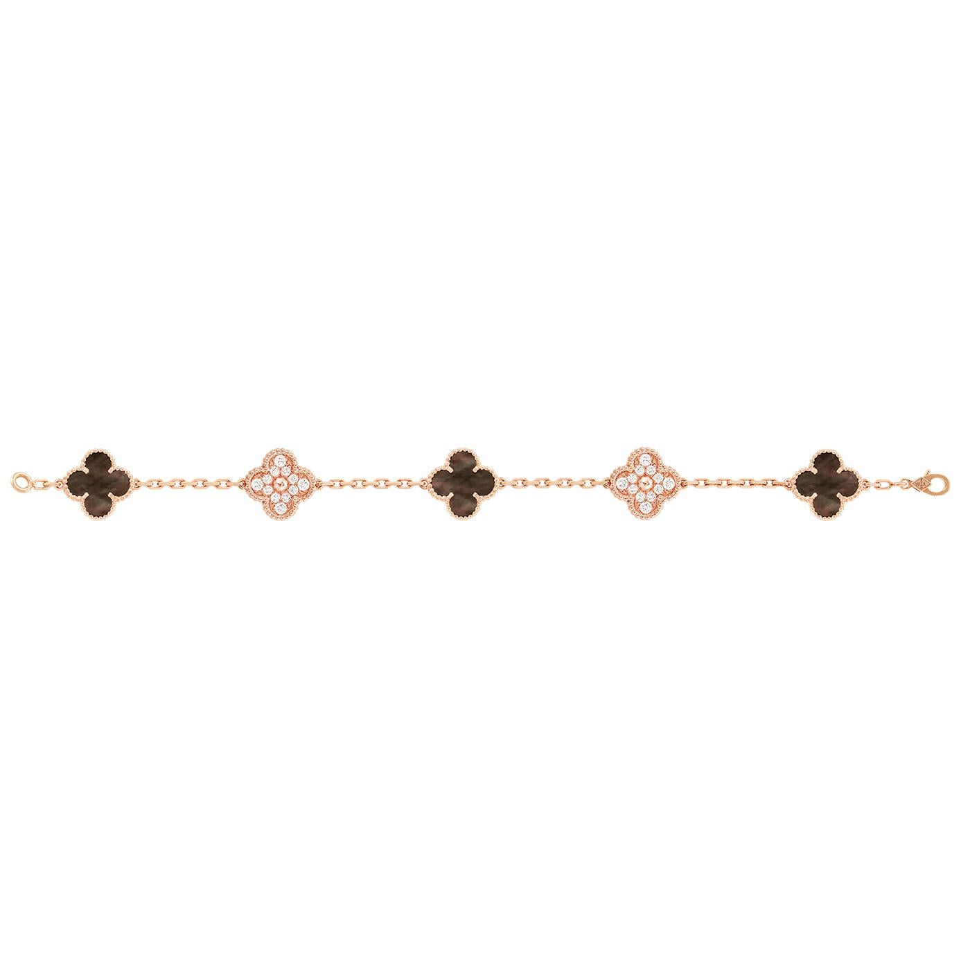 Vintage Alhambra bracelet, 5 motifs, 18K rose gold, gray mother-of-pearl, round diamonds; diamond quality DEF, IF to VVS.

Details:
Brand: Van Cleef & Arpels
Type: Vintage Alhambra Bracelet
Clasp: Hallmark Clasp Small Model
Stones: 24 stones, 0.96