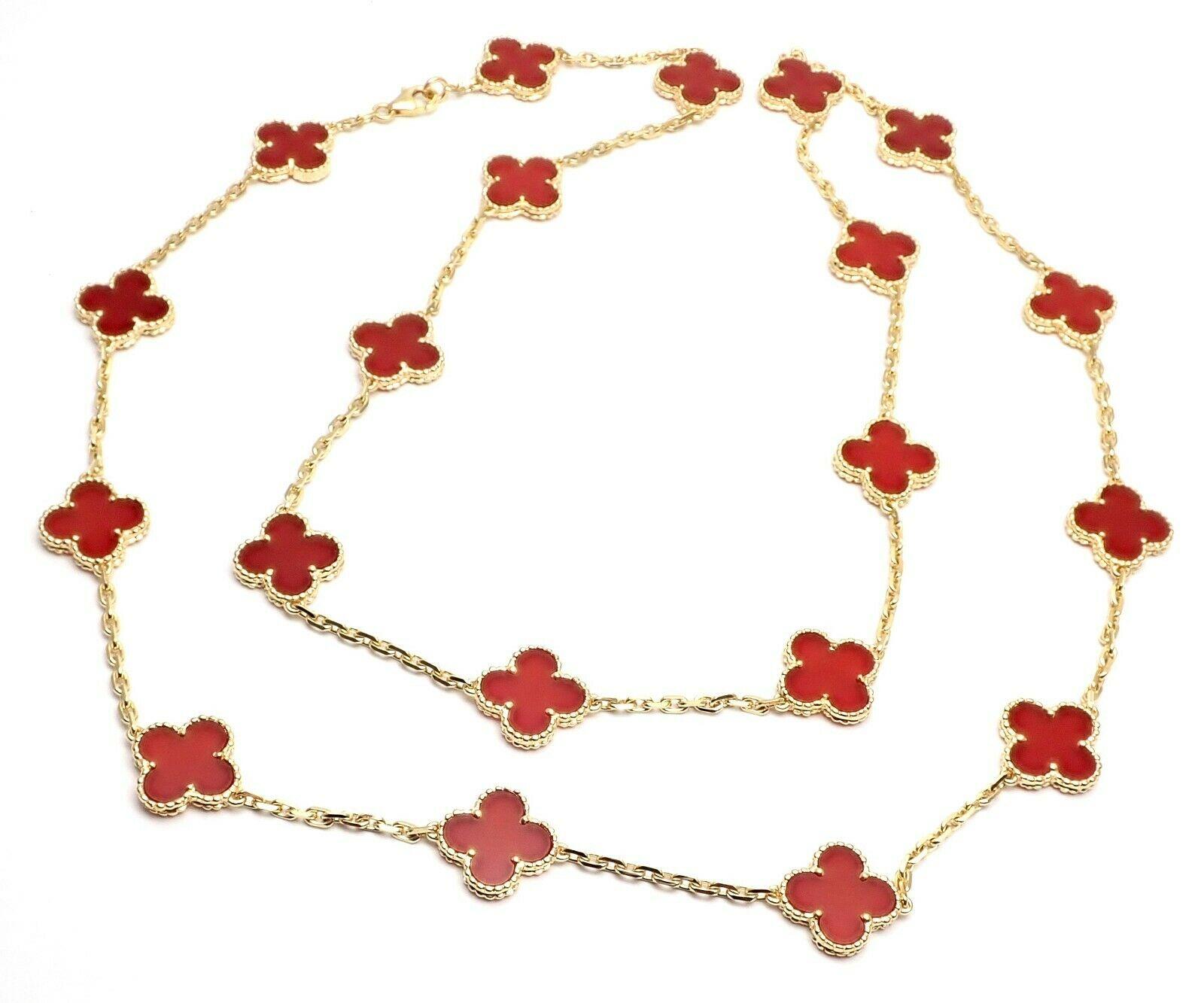 18k Yellow Gold Alhambra 20 Motifs Carnelian Necklace by Van Cleef & Arpels. 
With 20 motifs of carnelian Alhambra stones 15mm each.  
This necklace comes with service paper Van Cleef & Arpels store.
Details: 
Length: 32