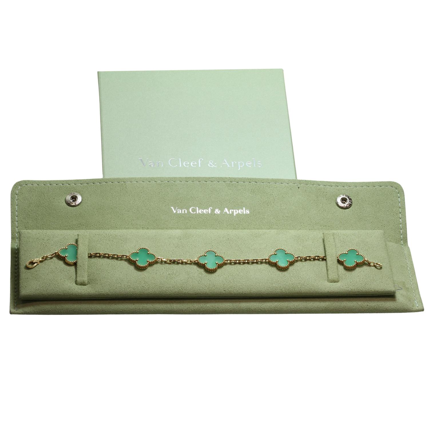 This rare Van Cleef & Arpels bracelet from the iconic Vintage Alhambra collection features 5 lucky clover charms crafted in 18k yellow gold and set with green chrysoprase.  This discontinued and special order bracelet comes with a certificate of