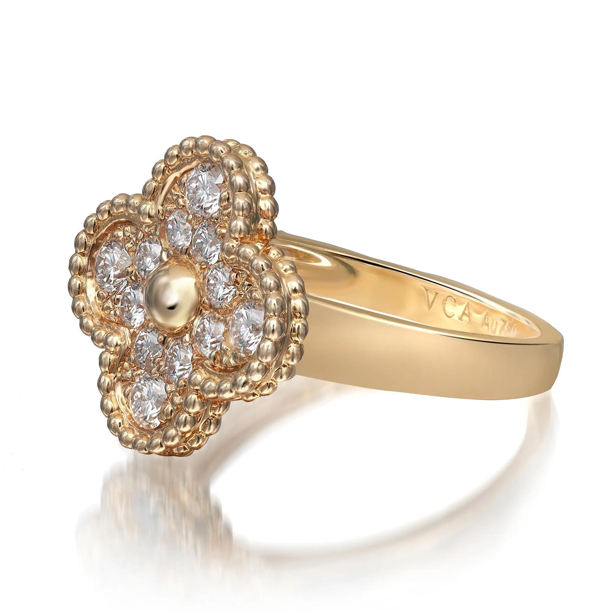 Van Cleef & Arpels Vintage Alhambra diamond ring. Inspired by the clover leaf, this ring showcases 12 round brilliant cut diamonds weighing 0.48 carat. Diamond quality: DEF color and IF to VVS clarity. Ring size: 52 US 6. Total weight: 6.40 grams.