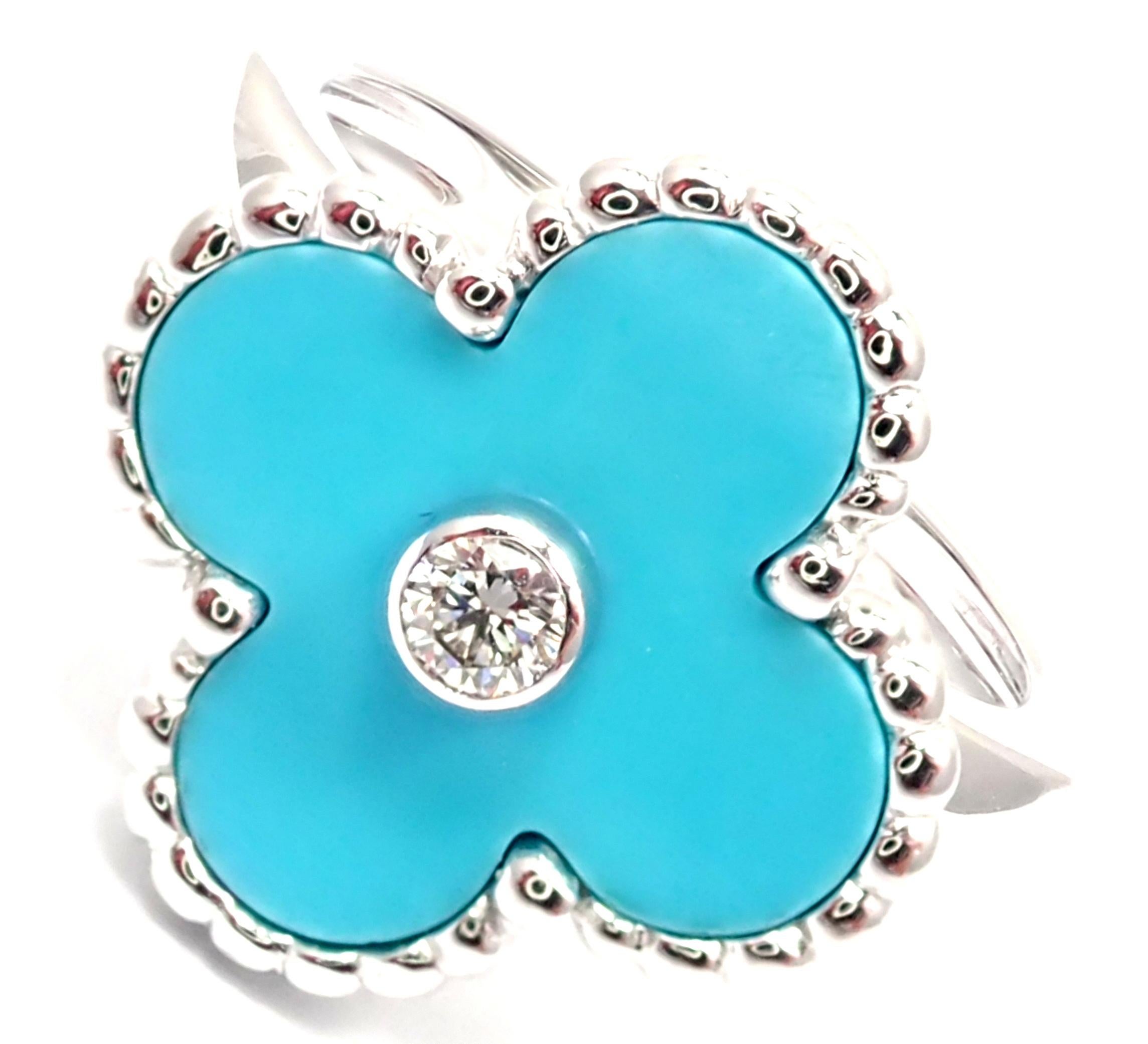 Van Cleef & Arpels Vintage Alhambra 18k White Gold Diamond Turquoise Ring.
With 1 Round brilliant cut diamond .06ct F/VS1
Alhambra cut turquoise.
This ring comes with service paper from Japanese Van Cleef & Arpels store.
Details:
Size - European 49,