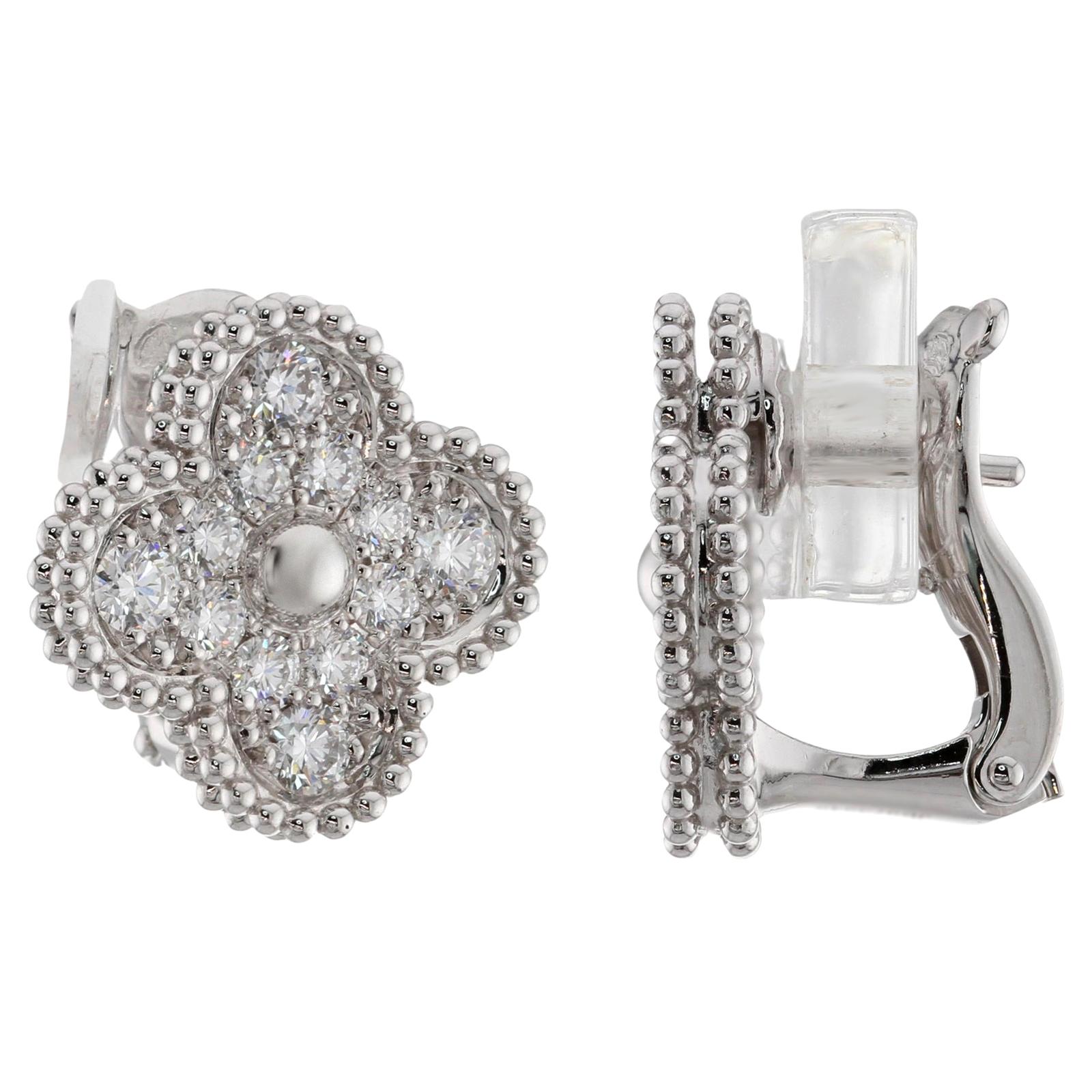 These stunning Van Cleef & Arpels earrings from the Vintage Alhambra collection feature the lucky clover design crafted in 18k white gold and with set with round brilliant D-E-F VVS1-VVS2 diamonds weighing an estimated 0.96 carats. Made in France