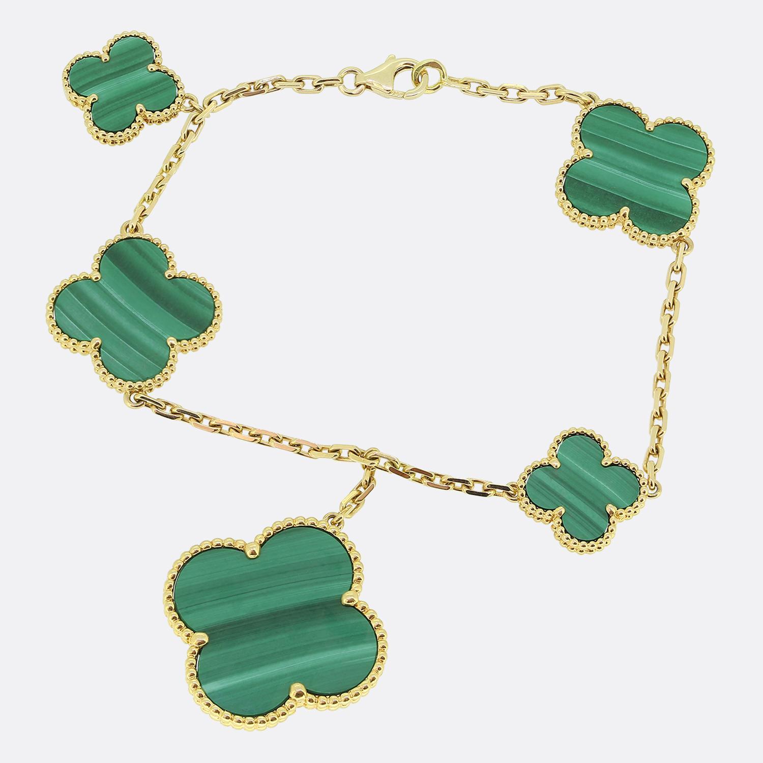 Here we have an iconic bracelet from the world renowned luxury jewellery house of Van Cleef & Arpels. This bracelet forms part of the Vintage Alhambra collection and showcases five yellow gold clover motifs of differing sizes with a beaded edging