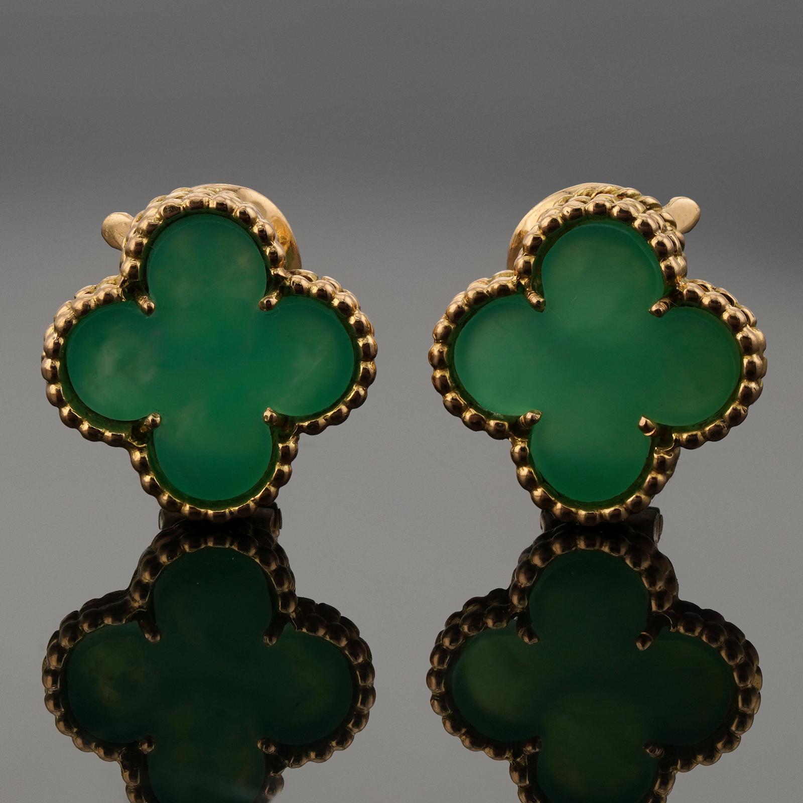 These rare vintage Van Cleef & Arpels earrings from the iconic Magic Alhambra collection are crafted in 18k yellow gold and feature a pair of lucky clover motifs inlaid with green chrysoprase in round bead settings. Made in France circa 1970s.