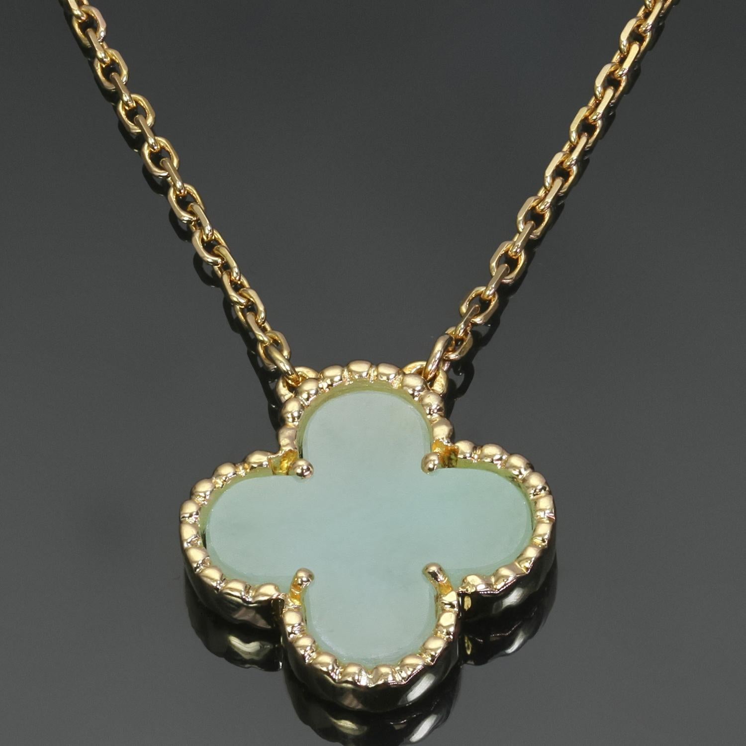 This rare necklace from Van Cleef & Arpels's iconic and festive Vintage Alhambra collection features a green jade lucky clover pendant set in 18k yellow gold completed with an adjustable chain with a length of 15 to 16.75 inches. Made in France