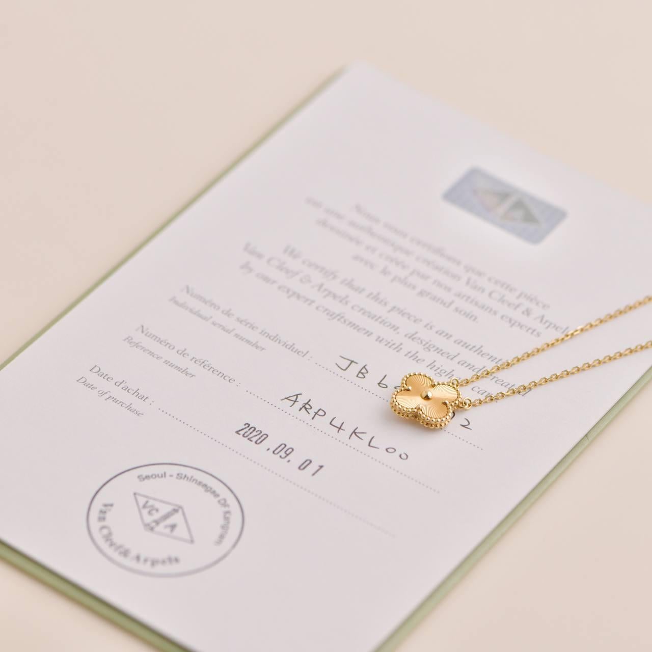 Van Cleef & Arpels Vintage Alhambra Guilloché 18K Yellow Gold Pendant Necklace In Excellent Condition In Banbury, GB