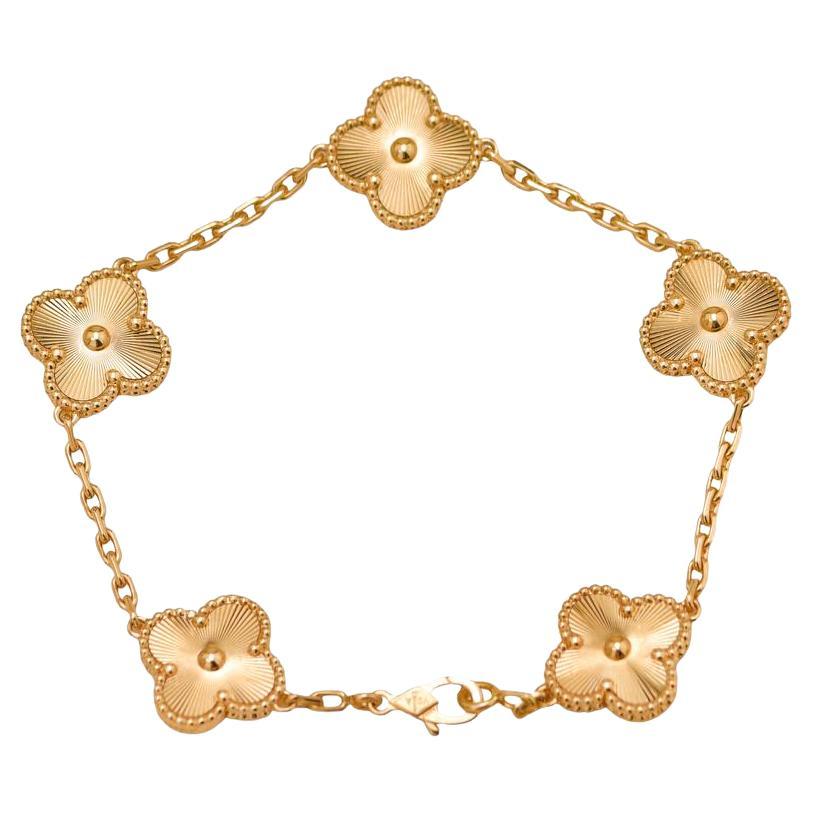Van Cleef
Arpels Vintage Alhambra Guilloché 5 Motifs Bracelet 18K Yellow Gold