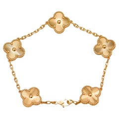 Van Cleef
Arpels Vintage Alhambra Guilloché 5 Motifs Bracelet 18K Yellow Gold