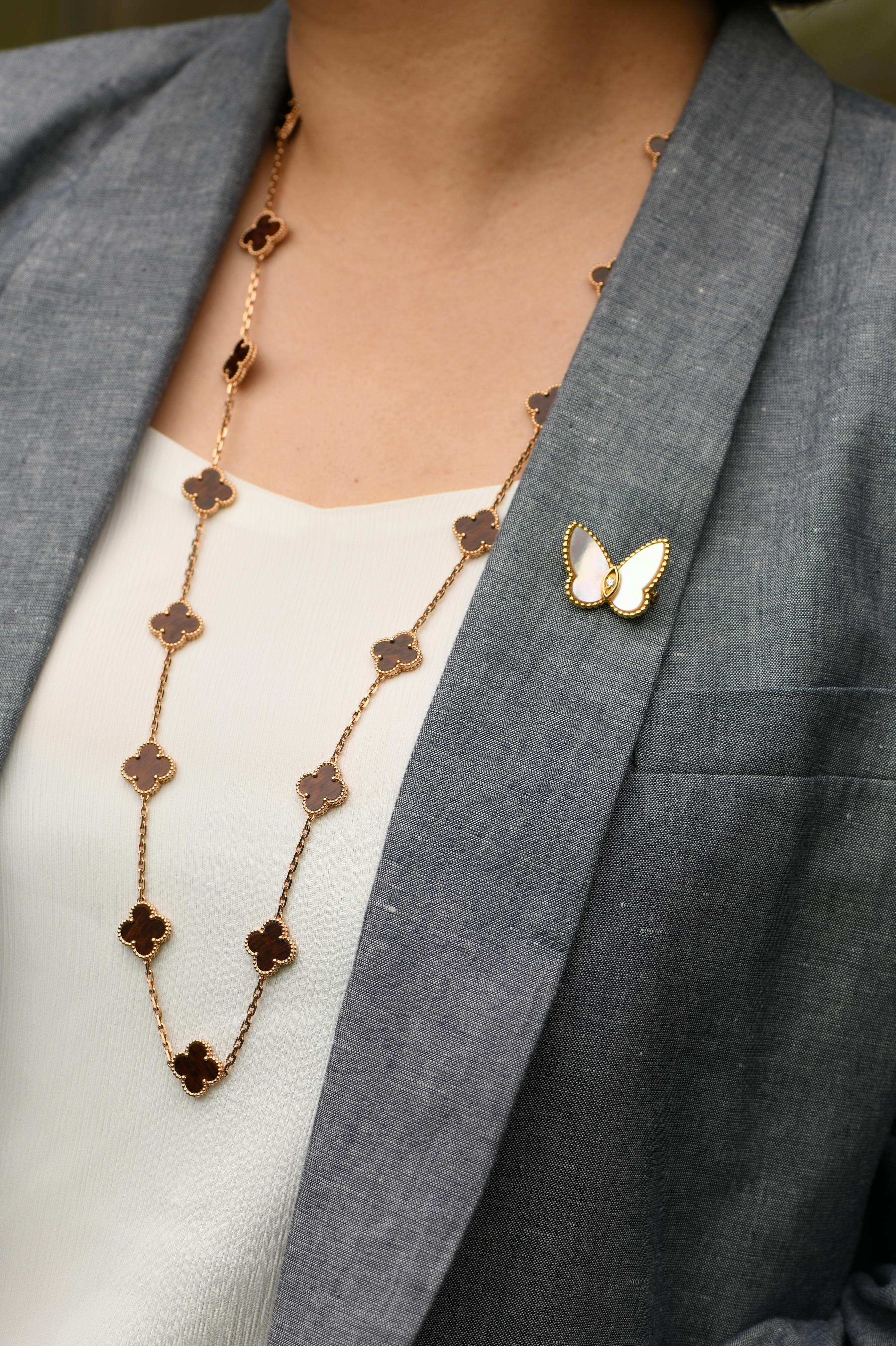 Iconic Vintage Alhambra necklace, featuring twenty letter wood clover motifs, set in 18k yellow gold.  Necklace is 34