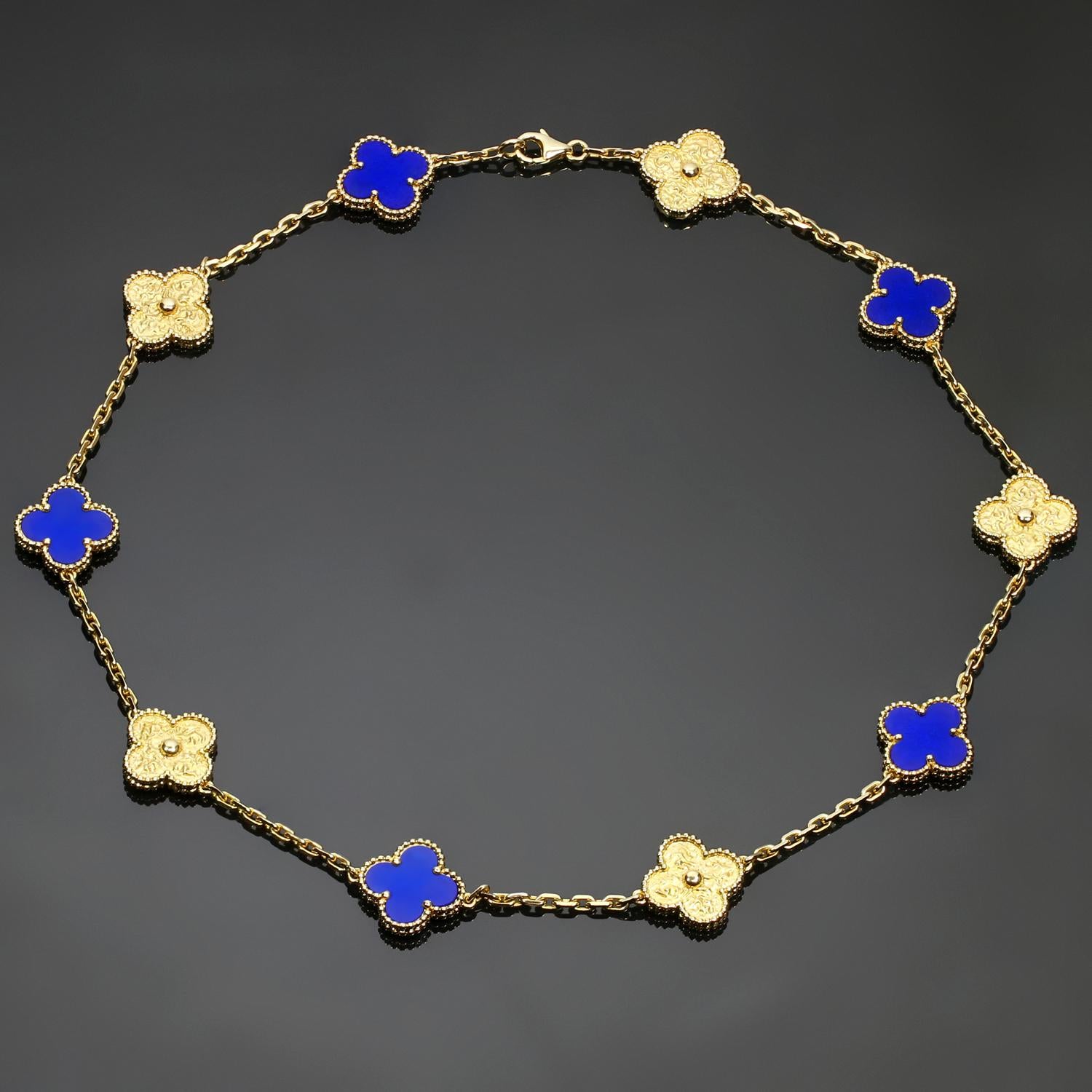 This rare and fabulous Van Cleef & Arpels necklace from the iconic Vintage Alhambra collection features 10 lucky clover motifs crafted in textured 18k yellow gold and inlaid with lapis lazuli in five of the charms. Made in France circa 2010s.