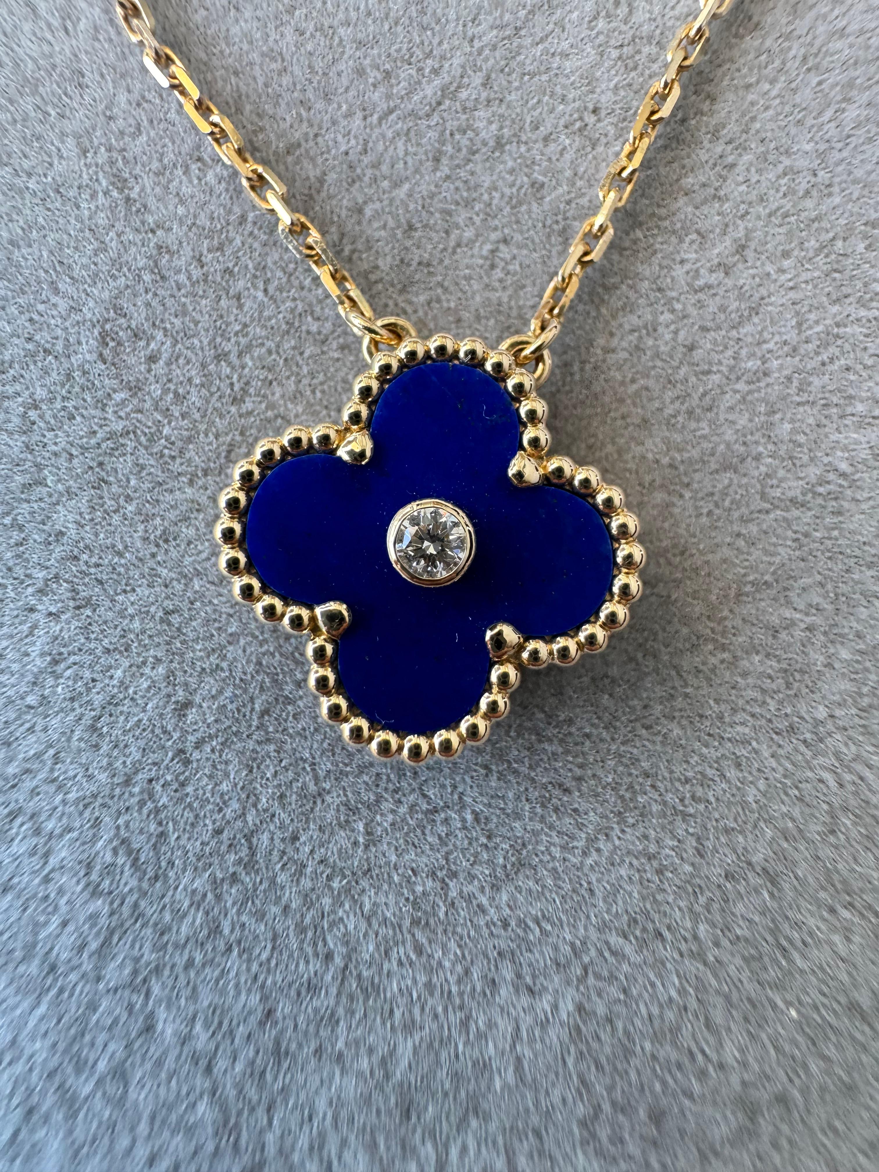 Holiday 2010 Pre-Owned Vintage Lapis Lazuli Pendant:
18K Yellow Gold AU 750 
42 CM Chain Length
6.71 Grams total weight
Blue Lapis Lazuli Motif - Single Stone - Back Side is Solid Gold
Color of Lapiz Lazuli is dark, midnight starry sky blue with