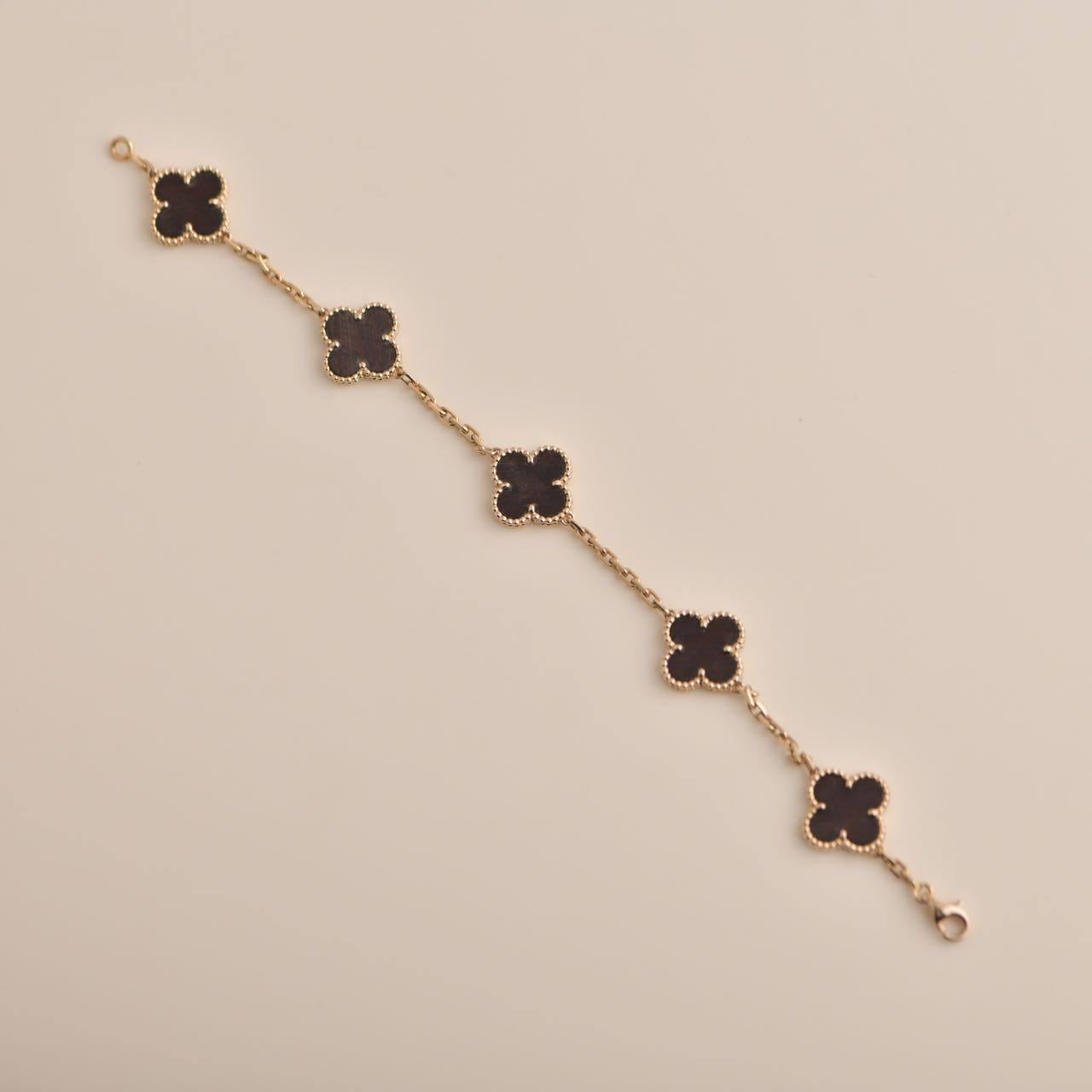  Van Cleef & Arpels Bracelet vintage Alhambra en or rose et bois de lettres Unisexe 