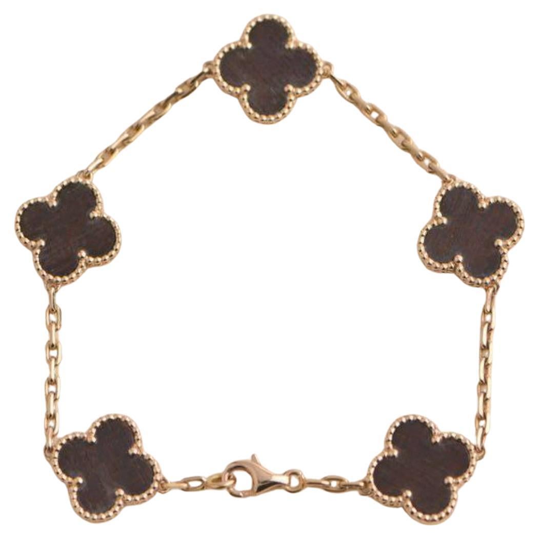 Van Cleef & Arpels Bracelet vintage Alhambra en or rose et bois de lettres