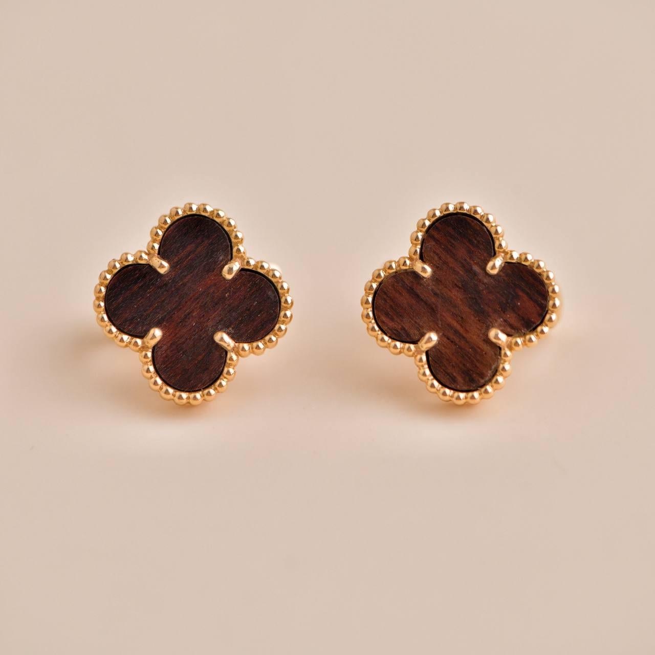 This is a very rare limited edition. VCA doesn't produce letter wood earring collection anymore. This would be a very wise investment piece. 

SKU	AT-2592
Comes With	Pouch Only
Date	2013
Model	VCARO30V00
Serial Number	JB******
Metal	18k Rose