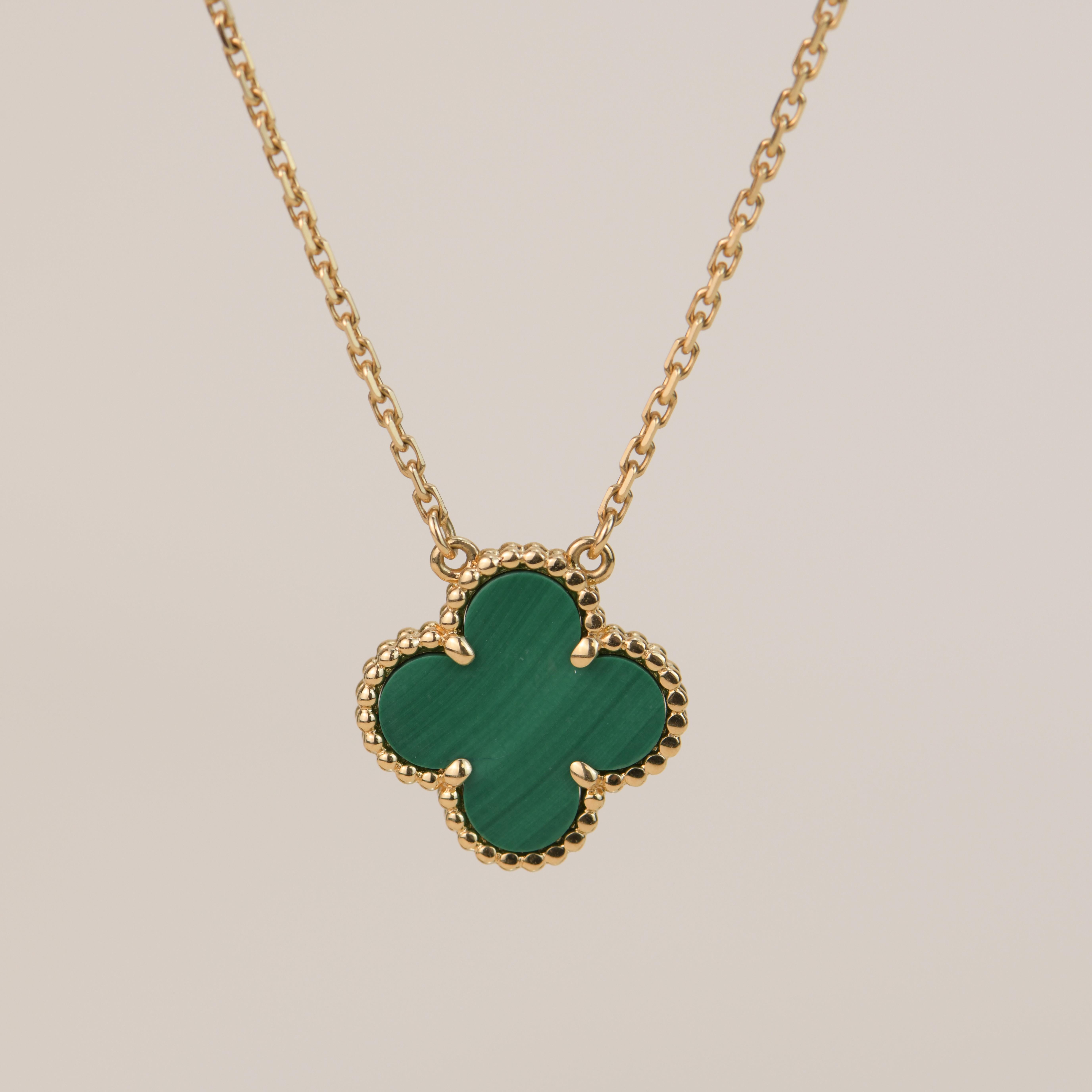 Highly collectible Van Cleef & Arpels Malachite vintage alhambra pendant. Set in 18 Yellow Gold.  
The pendant comes with a VCA original box and certificate of authenticity. 

Brand:  Van Cleef & Arpels
Model:  ARO9VA00
Date:  2015
Retail Price: