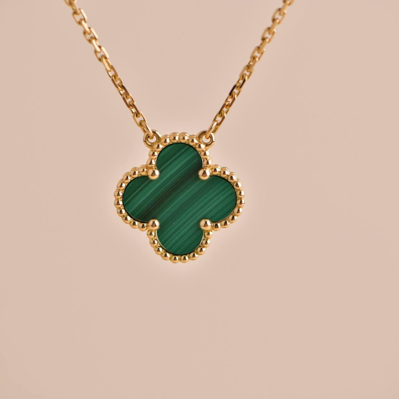 Van Cleef & Arpels Vintage Alhambra Malachite 18K Yellow Gold Pendant In Excellent Condition In Banbury, GB