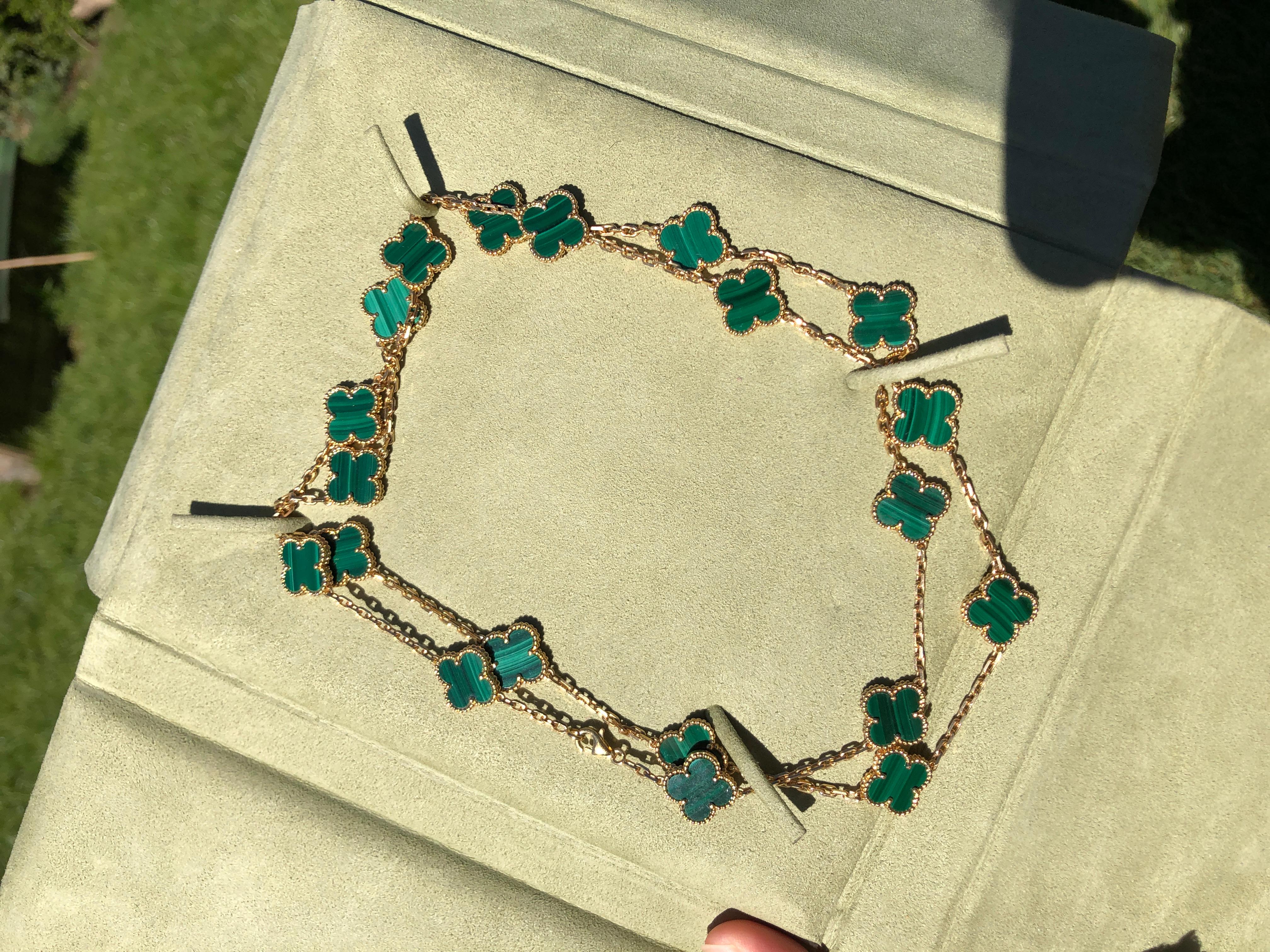18k Yellow Gold Alhambra 20 Motifs Malachite Necklace by Van Cleef & Arpels was made in 2014. With 20 motifs of Malachite Alhambra stones 15mm each. 

This necklace comes with VCA original pouch. Retail Price: £15000

Every piece we sell is 100%