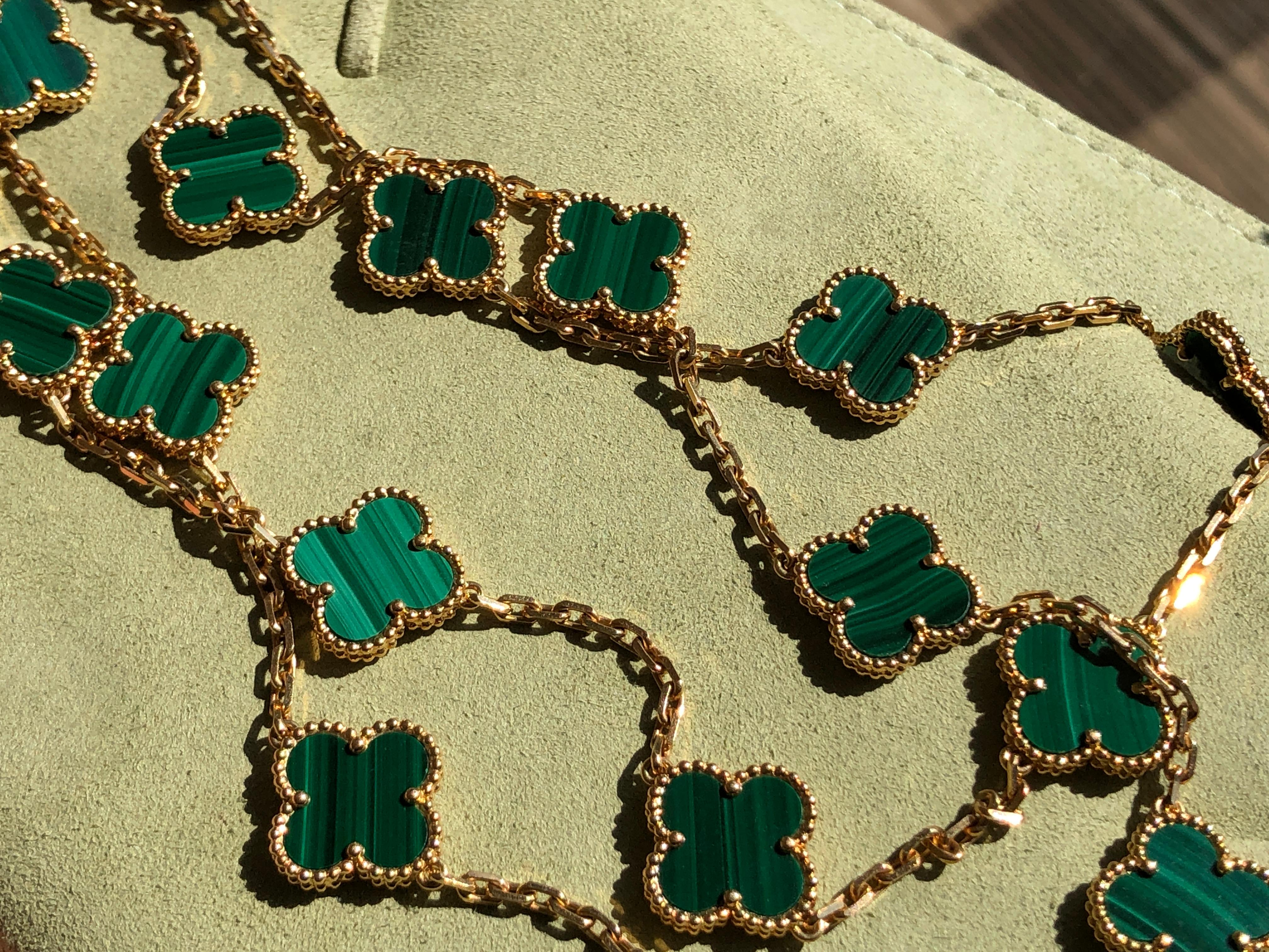 18k Yellow Gold Alhambra 20 Motifs Malachite Necklace by Van Cleef & Arpels was made in 2014. With 20 motifs of Malachite Alhambra stones 15mm each. 

This necklace comes with VCA original pouch. Retail Price: £15000

Every piece we sell is 100%