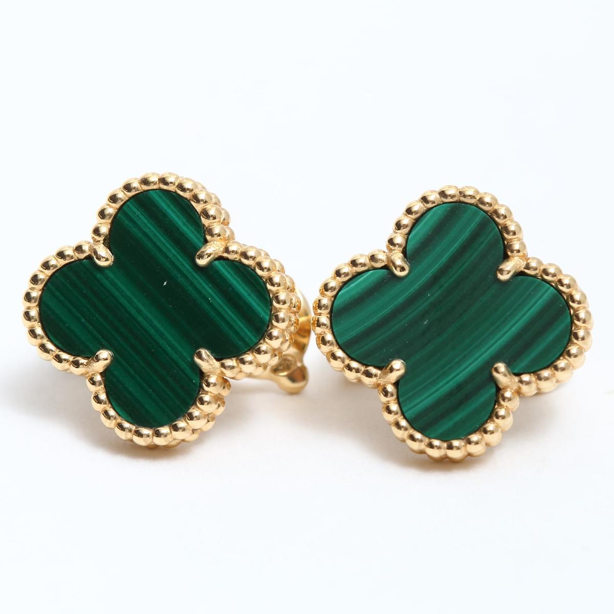 This classic vintage Van Cleef & Arpels earrings are  crafted in 18k yellow gold and feature 2lucky clover motifs inlaid withmalachite in round bead settings. Made in France circa 2000 Measurements: 0.59