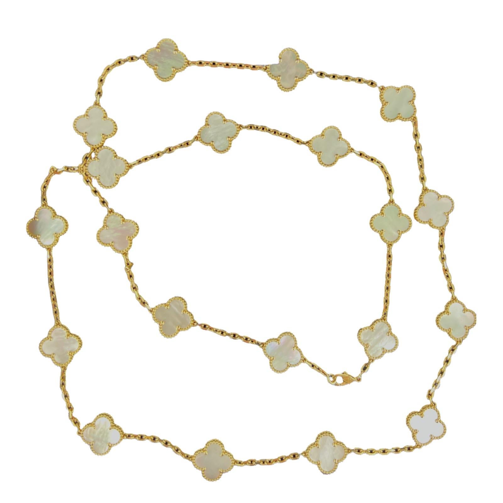Authentic Van Cleef & Arpels Alhambra 20 motif mother of pearl necklace fashioned in 18 karat yellow gold. The necklace measures 33.5 inches in length, and the clover stations measures 15 x 15mm. The necklace is hallmarked, signed, and numbered.