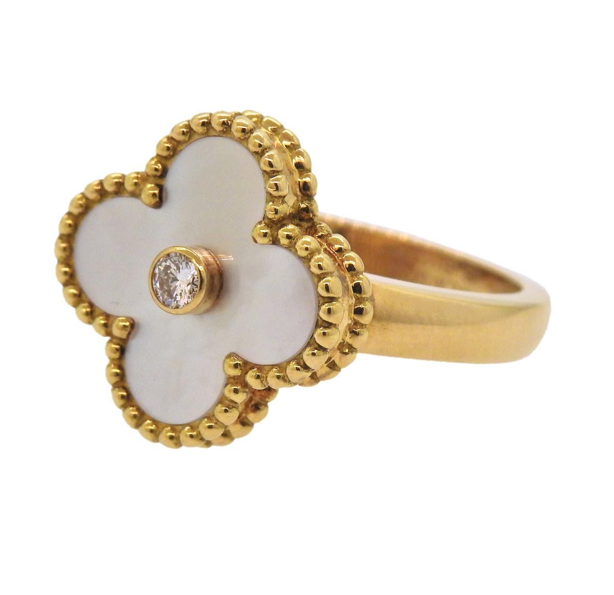  Vintage Alhambra ring, crafted by  Van Cleef & Arpels, set with 0.06ct VVS/FG diamond and mother of pearl top. Ring size - 4.75, ring top - 15mm x 15mm, weighs 6.4 grams. Marked: VCA, G750, 48, JB112***.