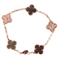 Van Cleef & Arpels Bracelet vintage Alhambra en or rose, nacre et diamants