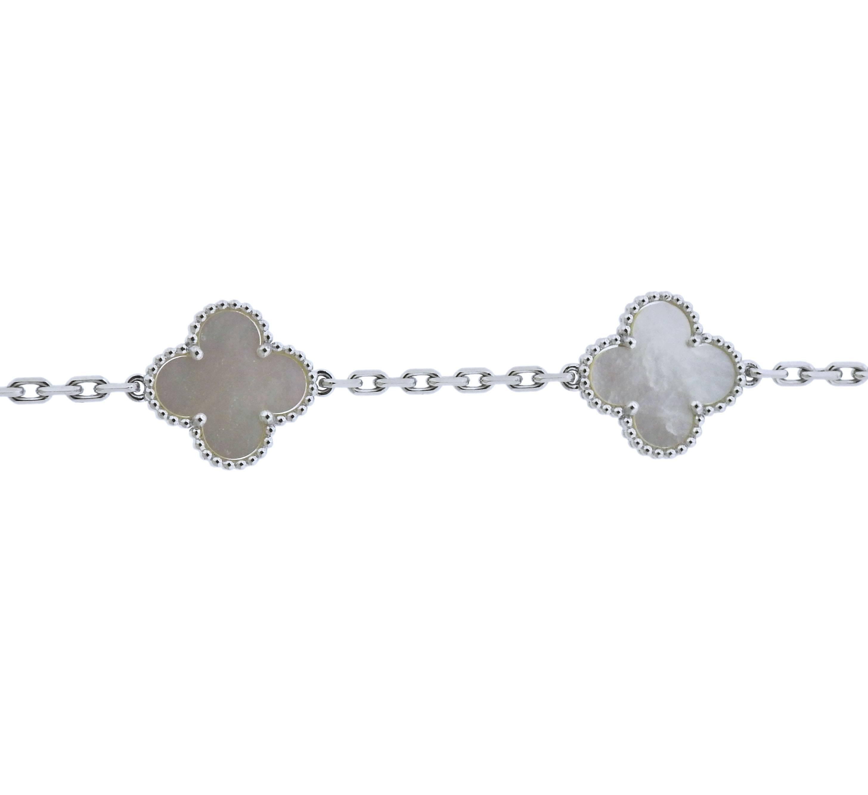  18k white gold five motif Vintage Alhambra bracelet by Van Cleef & Arpels. Retail $4150. Comes with VCA Box and COA. Bracelet is 7.5
