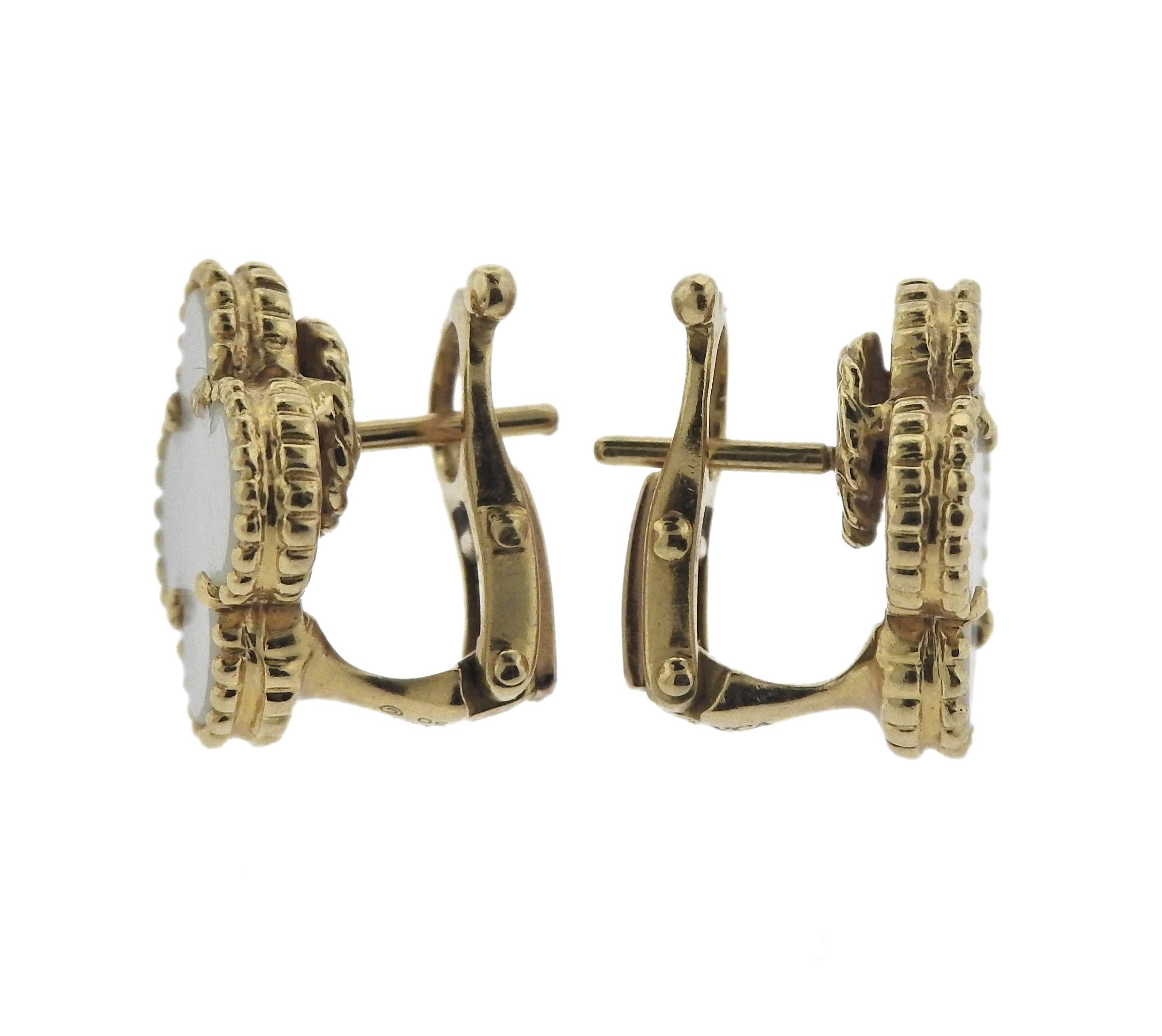 Pair of 18k yellow gold Vintage Alhambra earrings, crafted by Van Cleef & Arpels, set with mother of pearl. Come with box. Retail $3750. Earrings are 15mm x 15mm, weigh 6.3 grams. Marked CL 94***, VCA, 750.