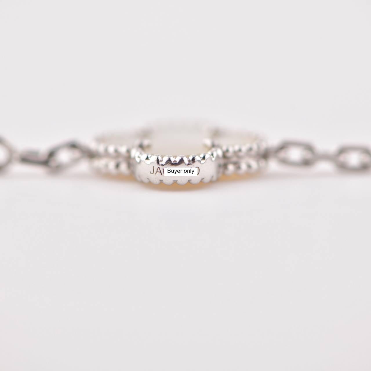 white van cleef bracelet