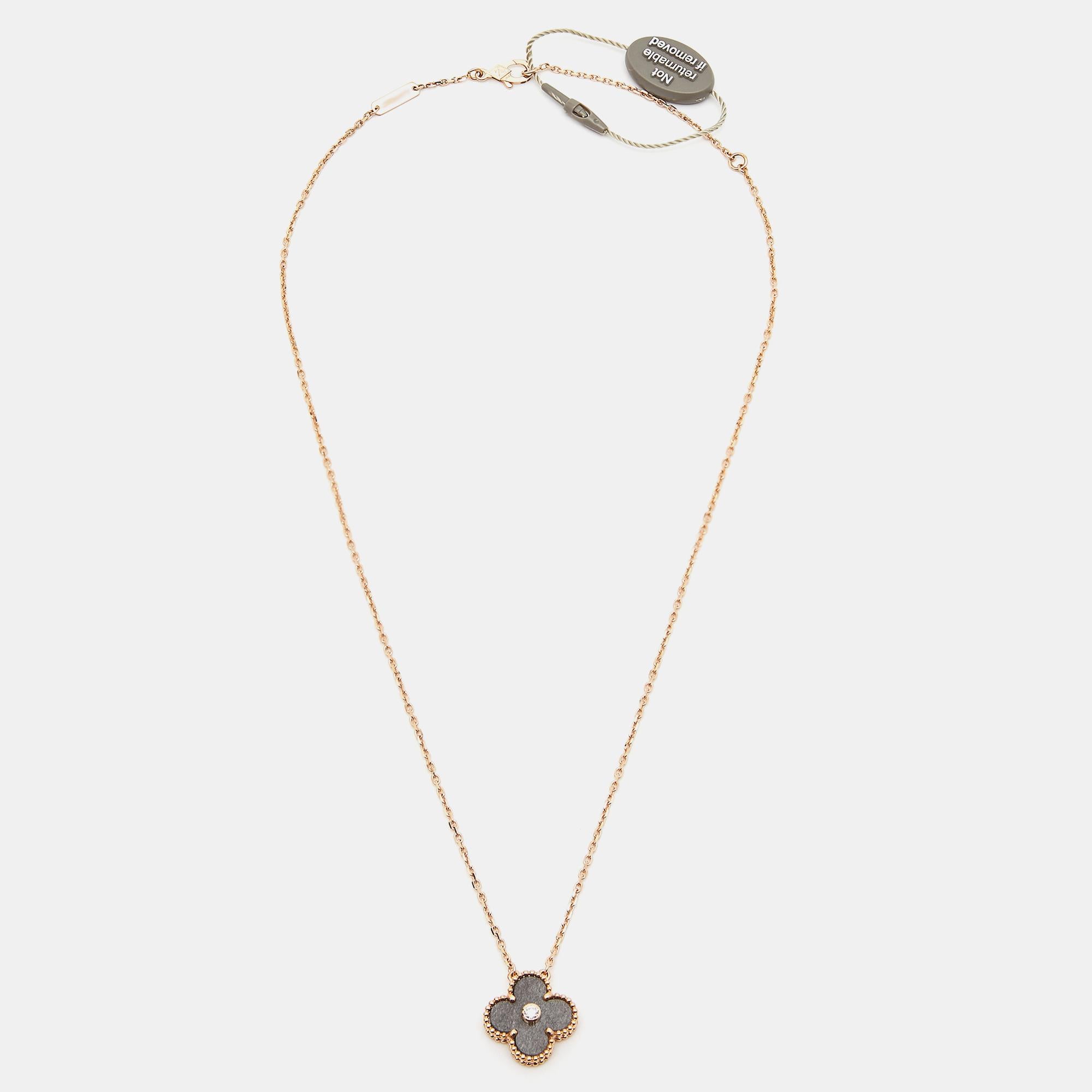 Invest in this opulent Van Cleef & Arpels 2023 Holiday pendant necklace from their iconic Vintage Alhambra collection. The 18k rose gold Alhambra pendant is set with a single diamond stud and held by a chain. A sweet mix of minimalist style and
