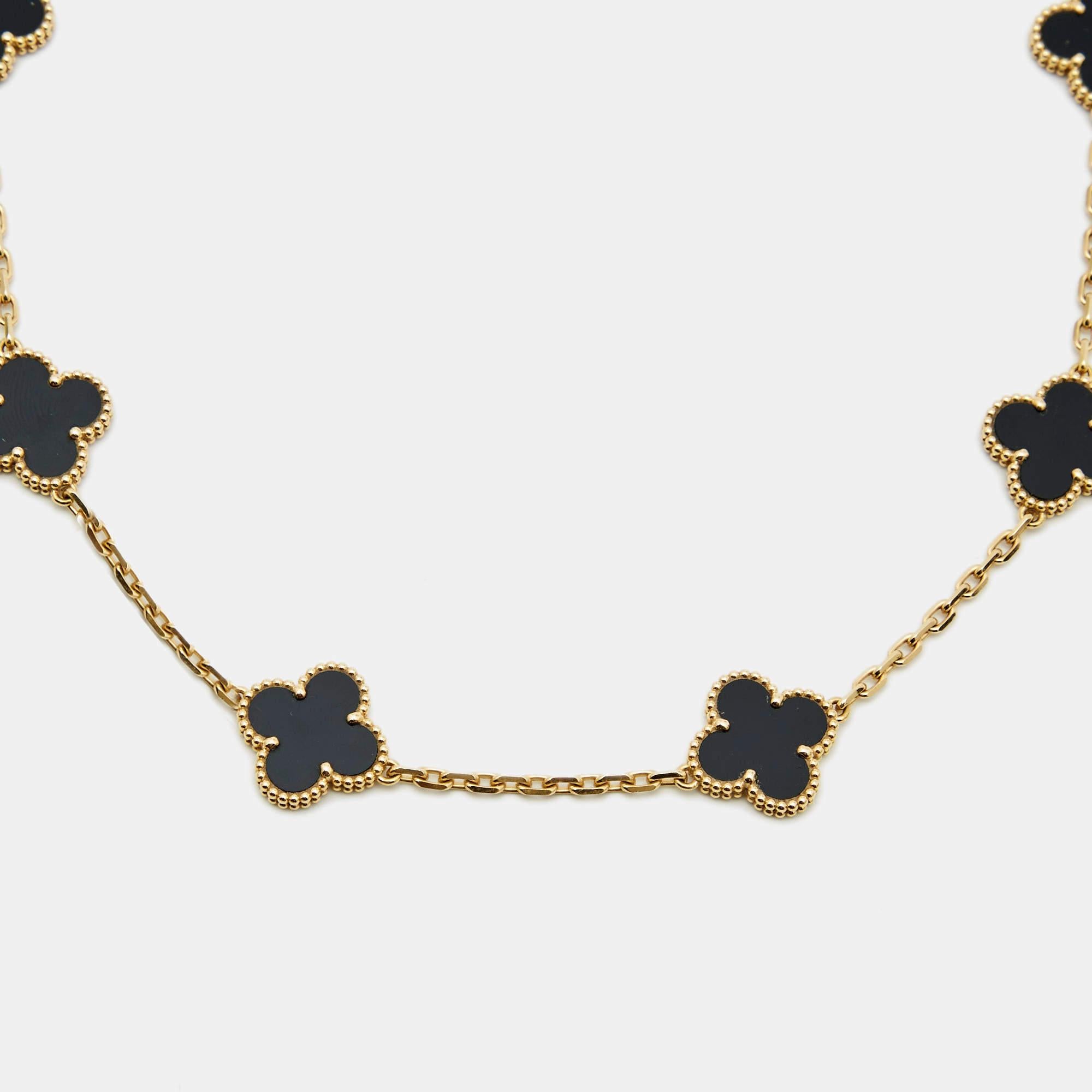 Adorn your neck with this elegant necklace from Van Cleef & Arpels. The necklace has a beautiful weaving of ten motifs crafted from 18k yellow gold and embedded with Onyx stones. The shape of the motifs has been inspired by clover leaves and they