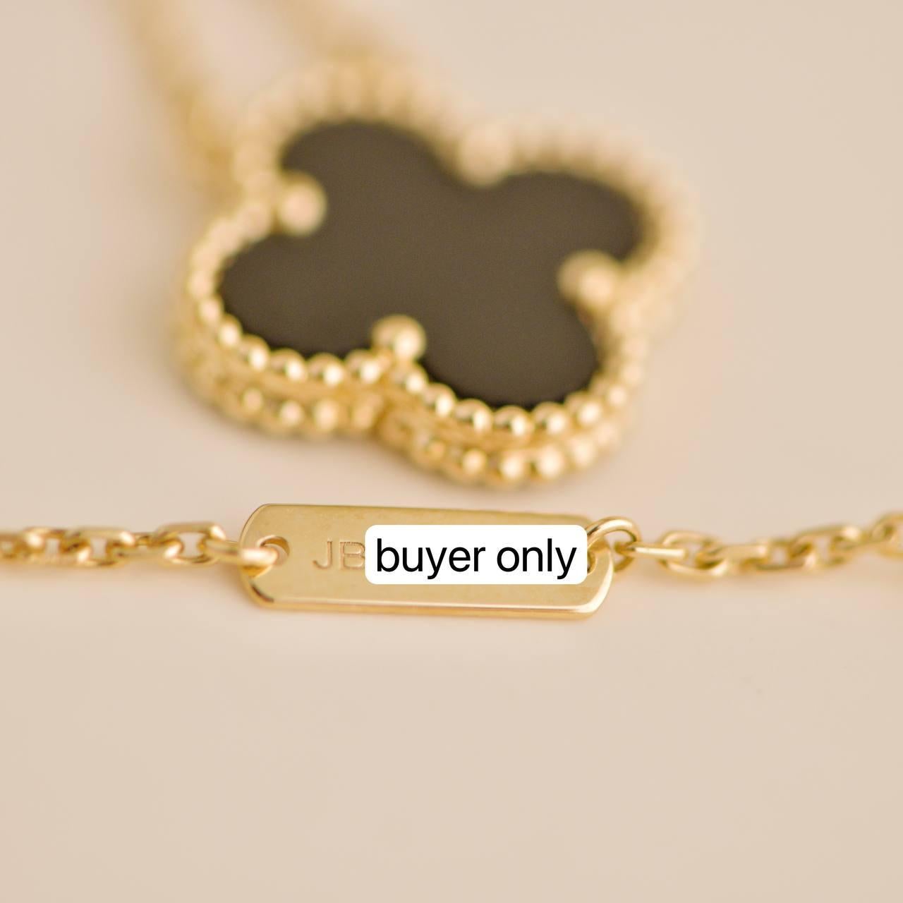 Van Cleef & Arpels Collier vintage Alhambra en or jaune 18 carats et onyx 1