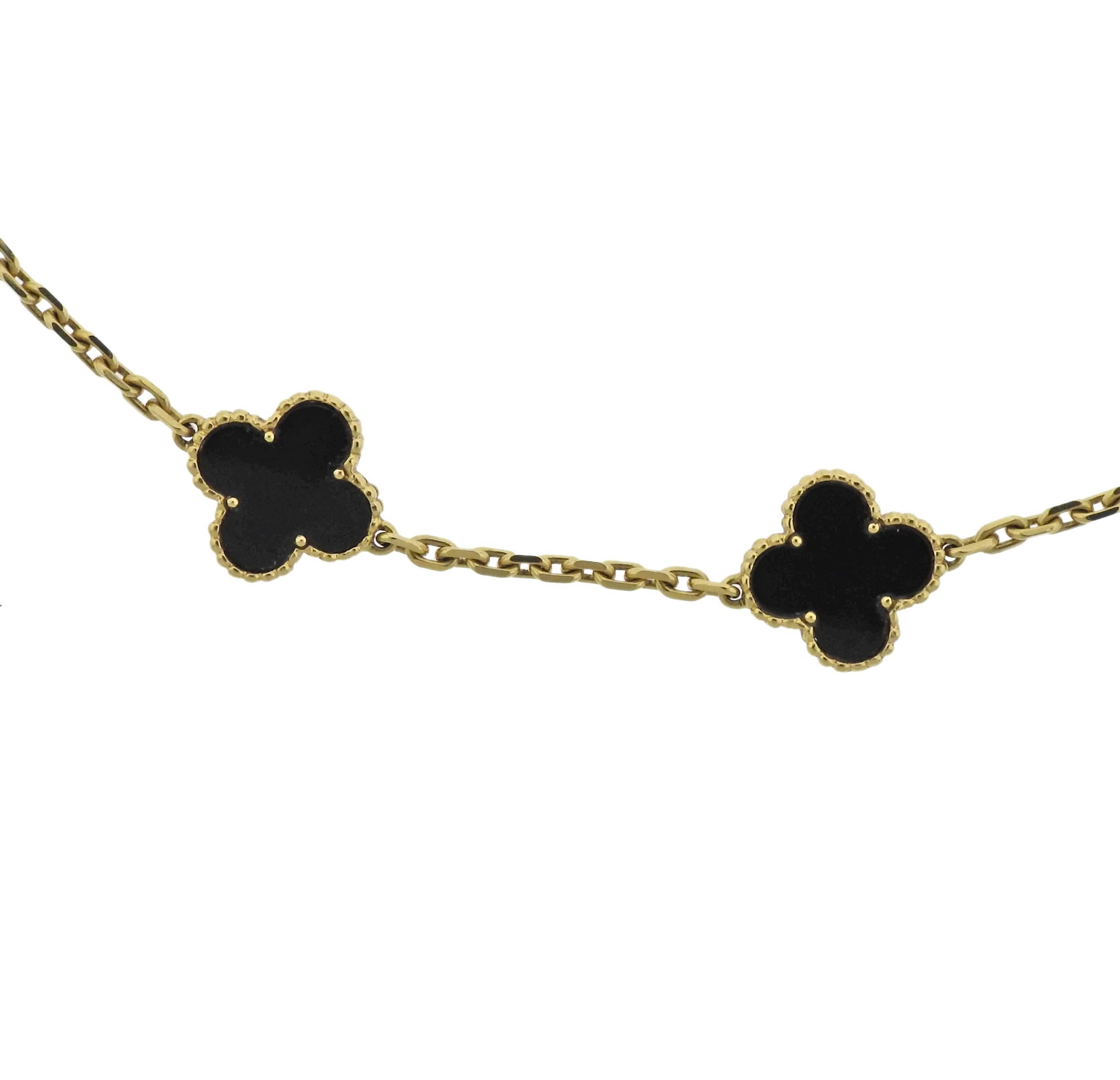  18k yellow gold Alhambra necklace, featuring ten clover motifs with onyx. Crafted by Van Cleef & Arpels, currently retail for $7850. Necklace is 17