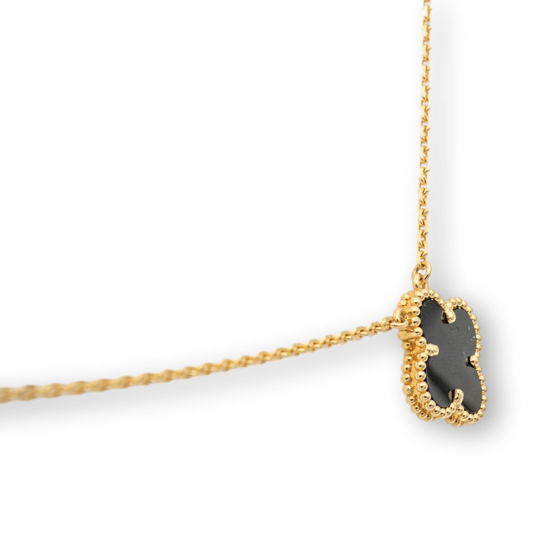 Van Cleef & Arpels necklace from the Vintage Alhambra collection finely crafted in 18 karat yellow gold featuring a 15 mm four leaf clover black onyx motif pendant hanging off a 16 inch link chain with lobster closure. This pendant is in new